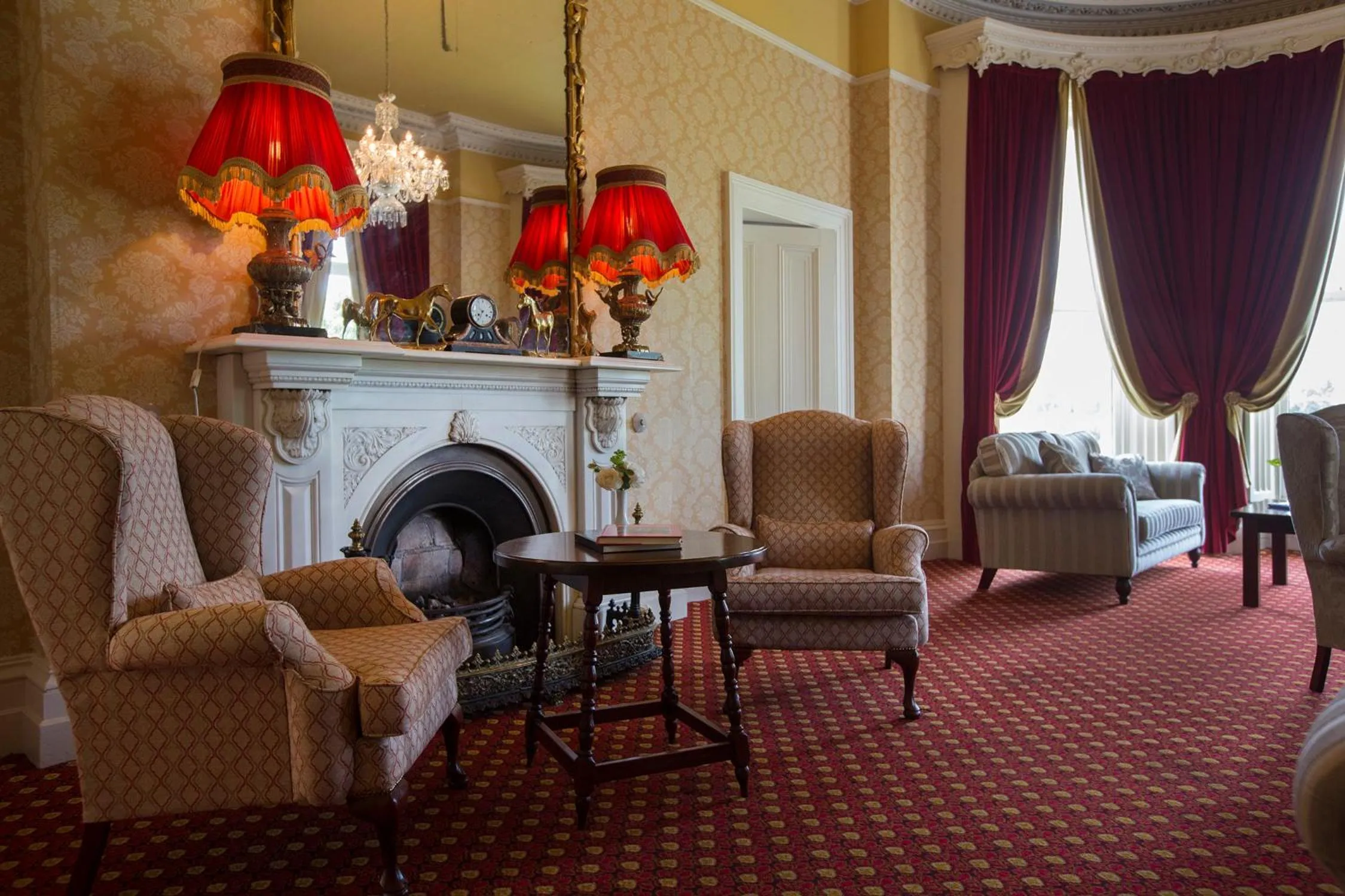 Communal lounge/ TV room in Hotel Minella & Leisure Centre