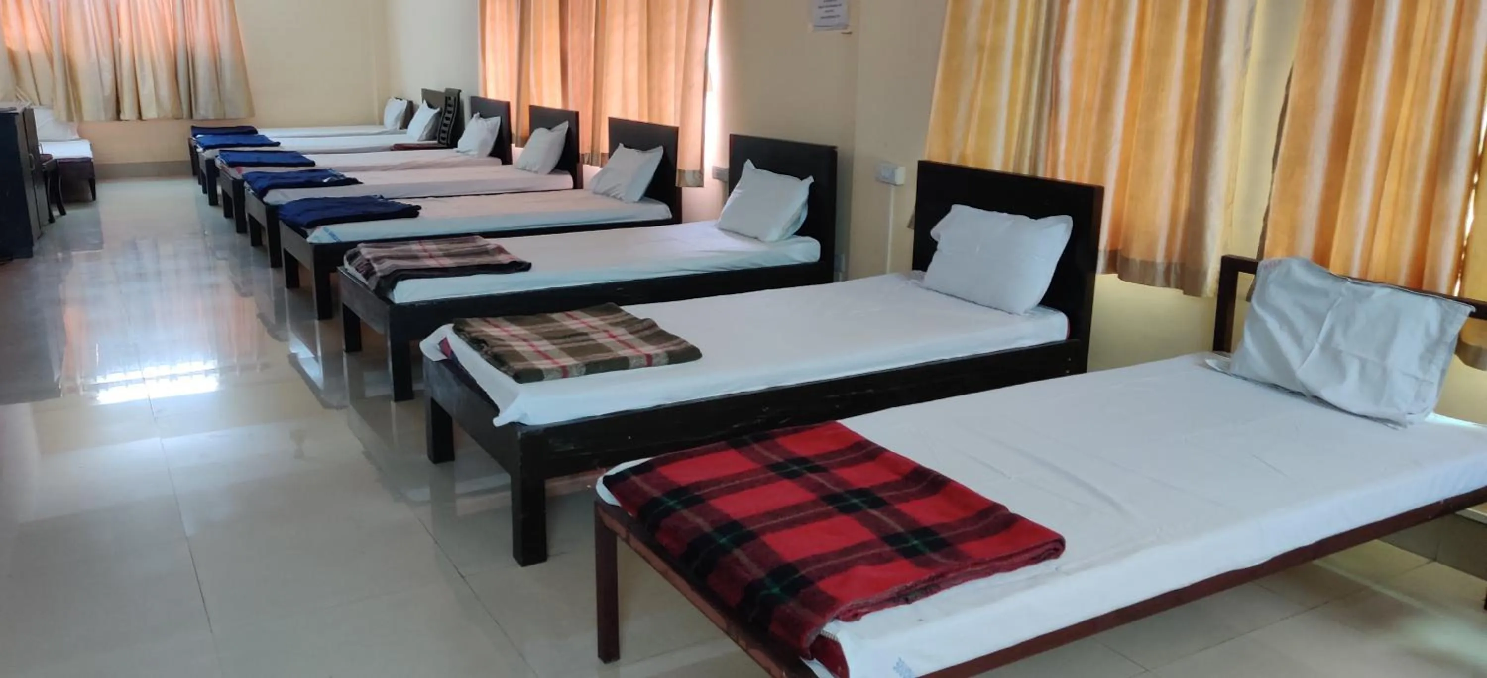 Bed in The Salvation Army RED SHIELD GUEST HOUSE