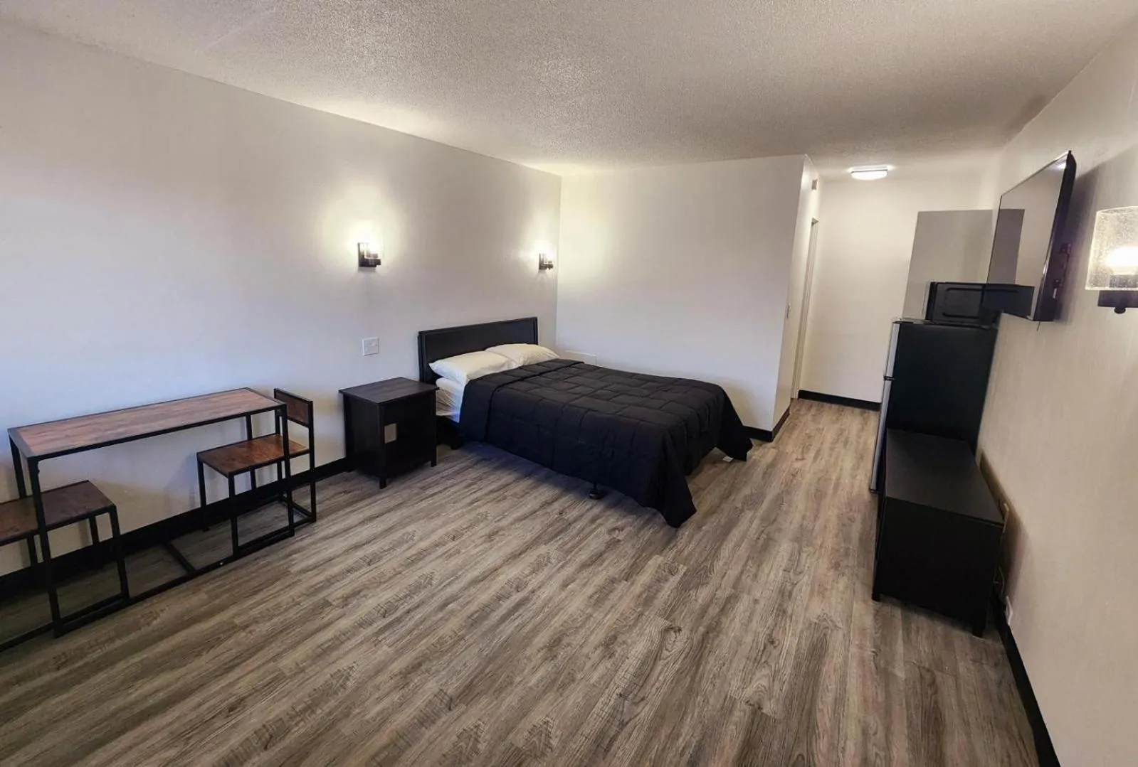 Bed in The Hastings Inn Salina