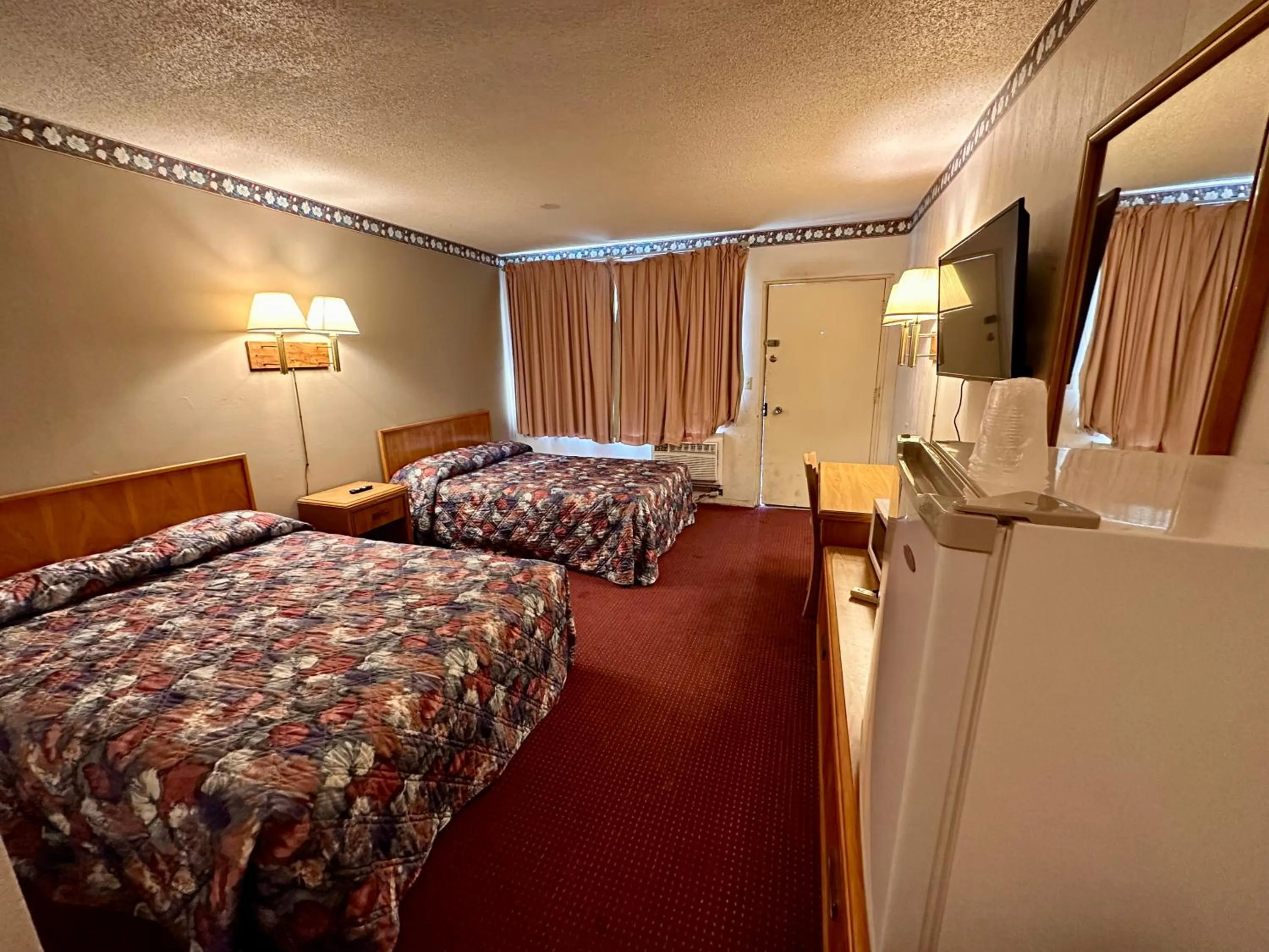 Bed in Ambassy Motel