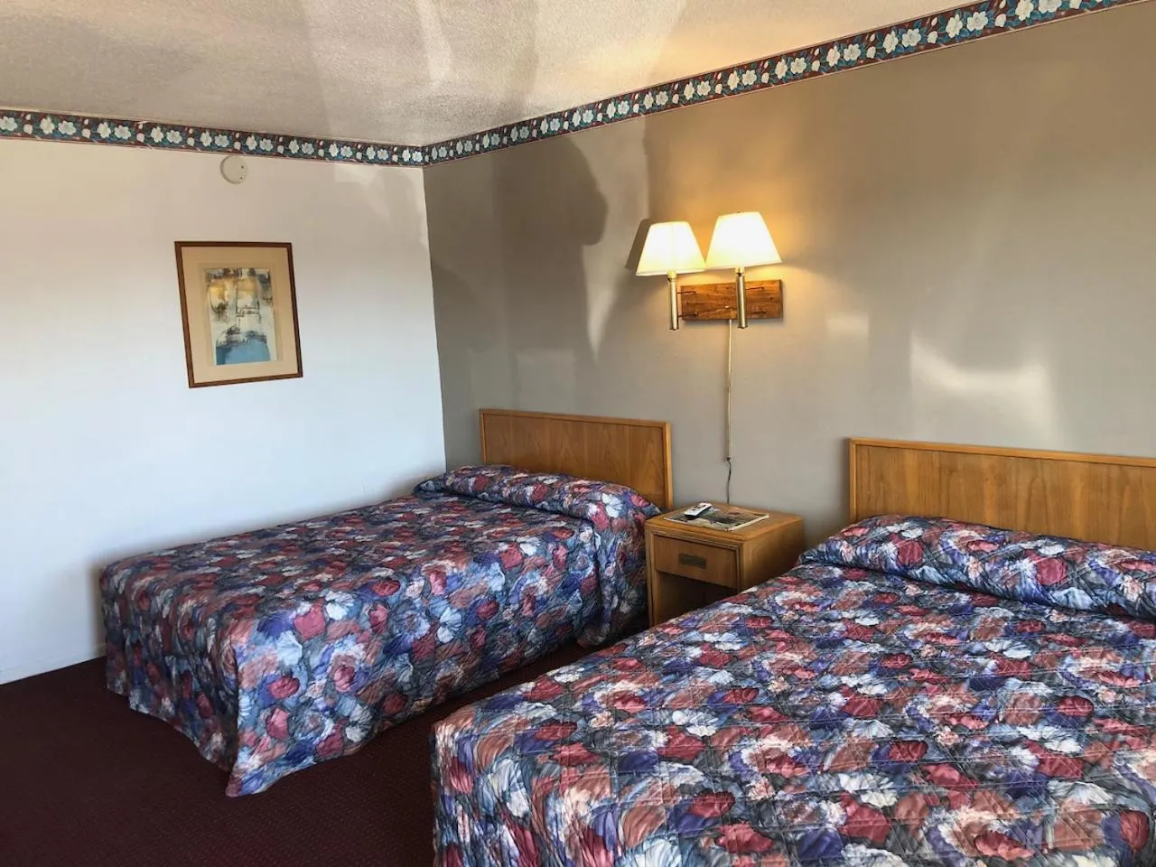 Bed in Ambassy Motel