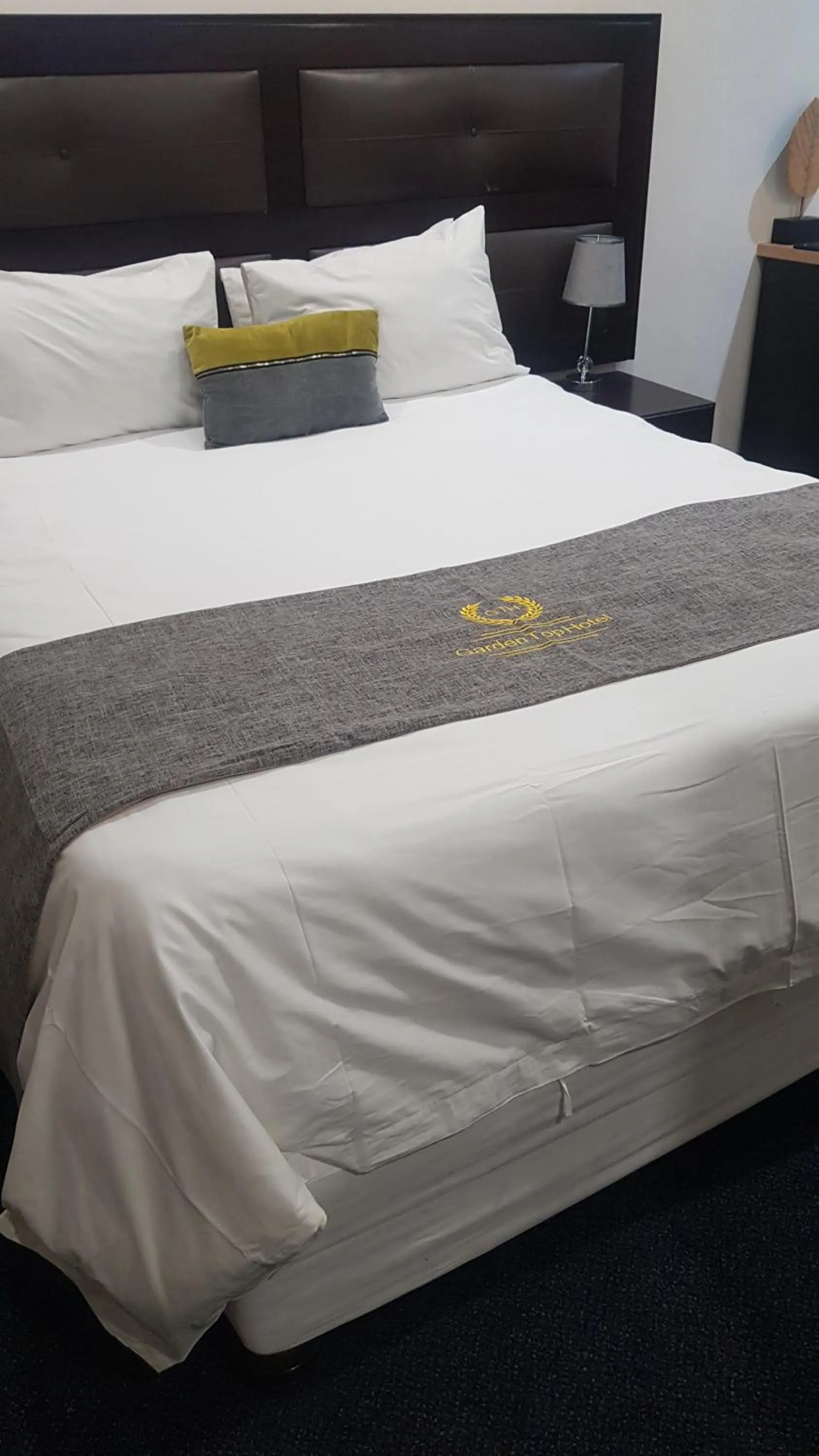 Bed in Garden Top Hotel