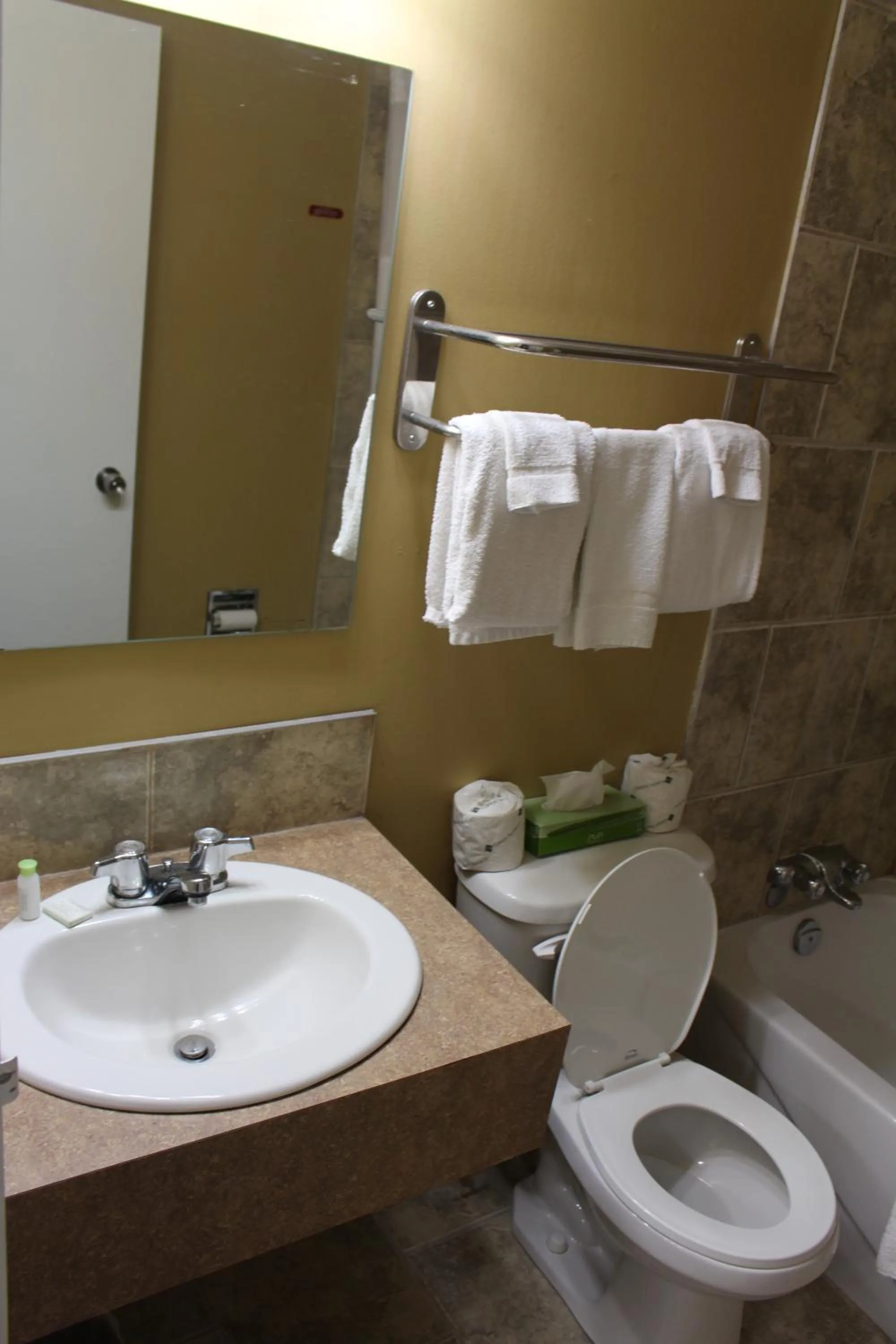 Toilet in Travelodge by Wyndham Swift Current