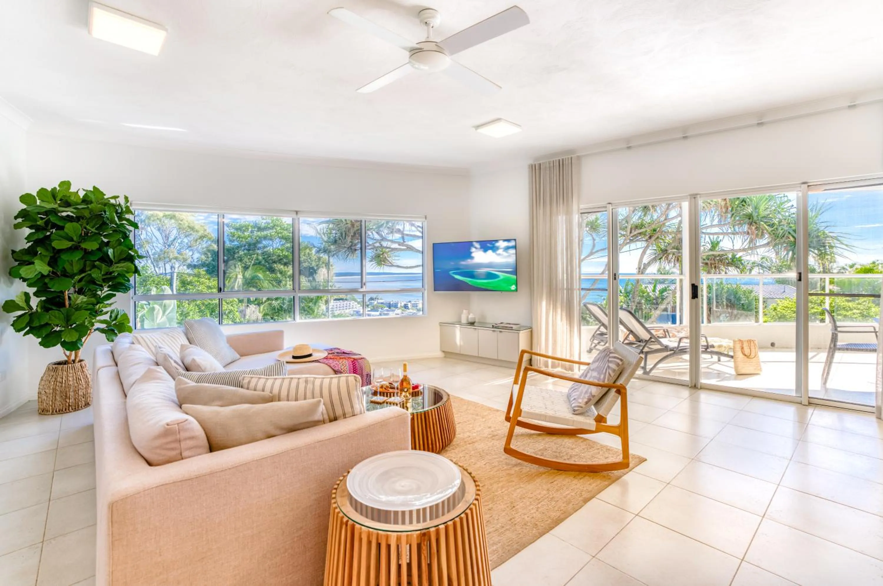 Communal lounge/ TV room in The Lookout Resort Noosa