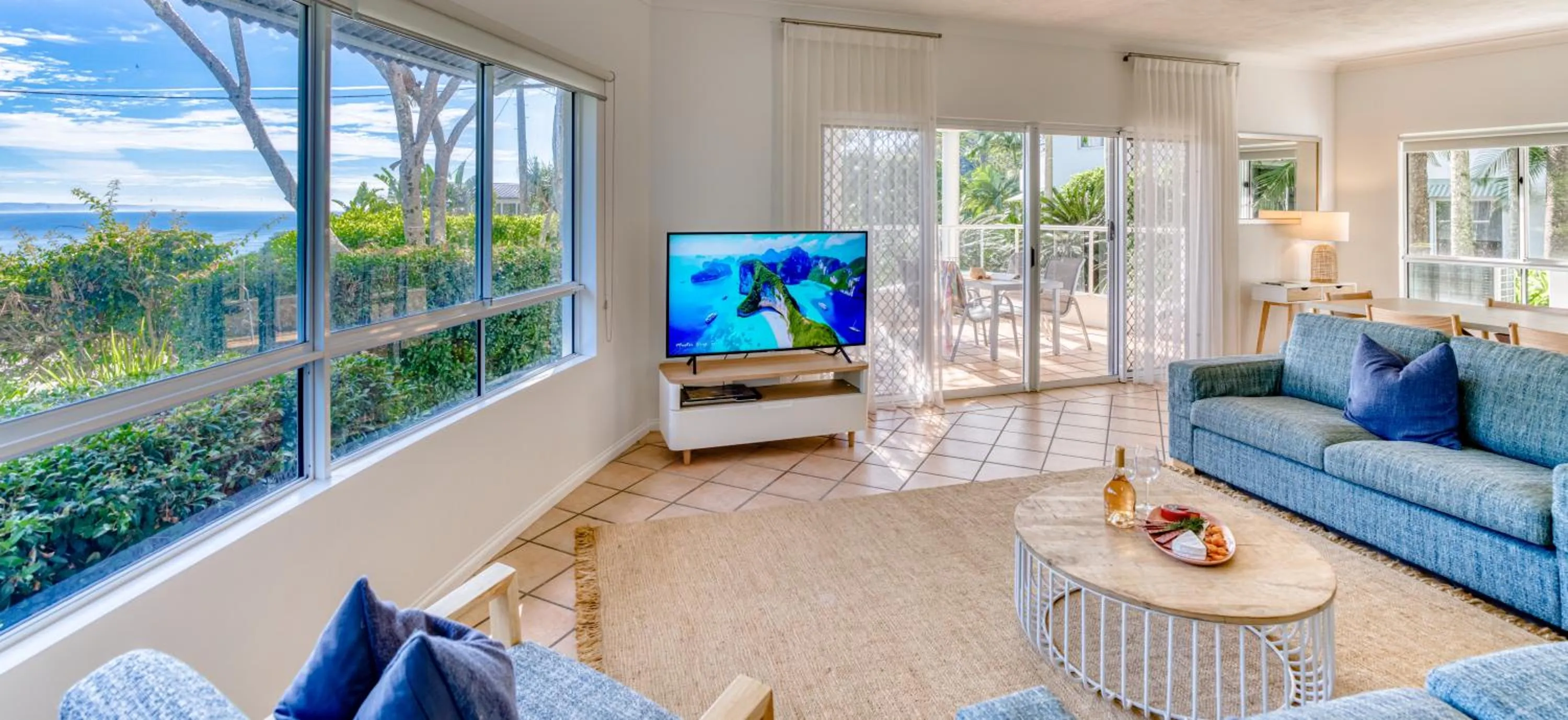 Communal lounge/ TV room in The Lookout Resort Noosa