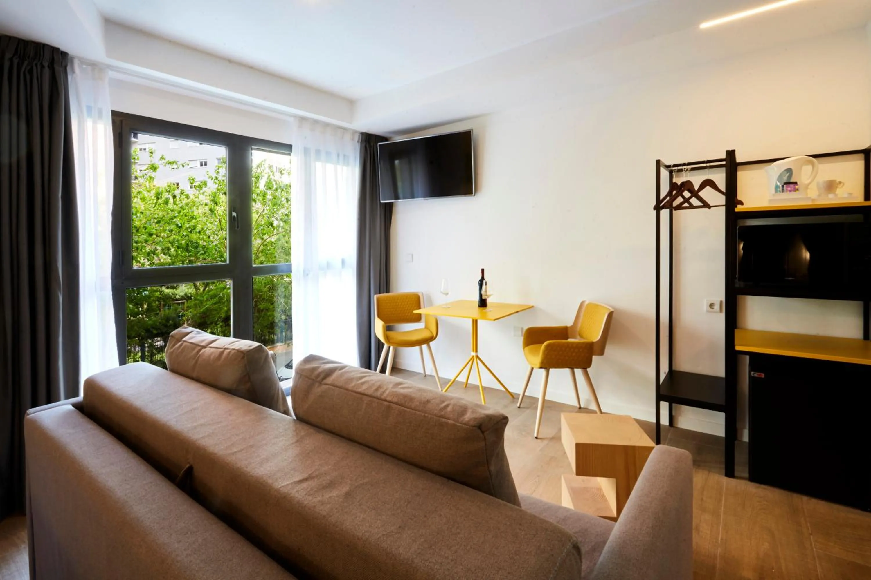 Communal lounge/ TV room in Sercotel Valencia Alameda 41