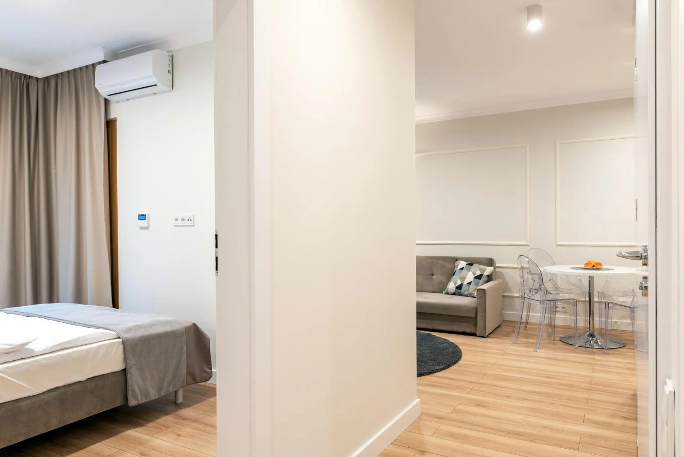 Seating area, Bed in Mennica Central Apartments