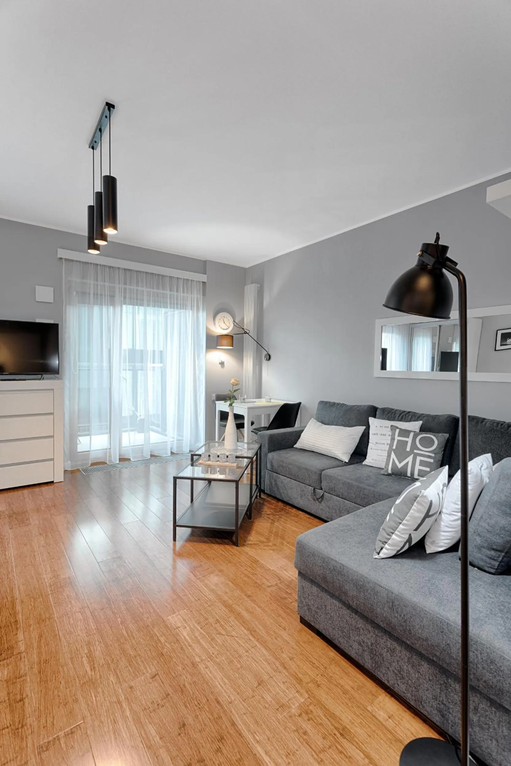 Living room, Bed in Mennica Central Apartments