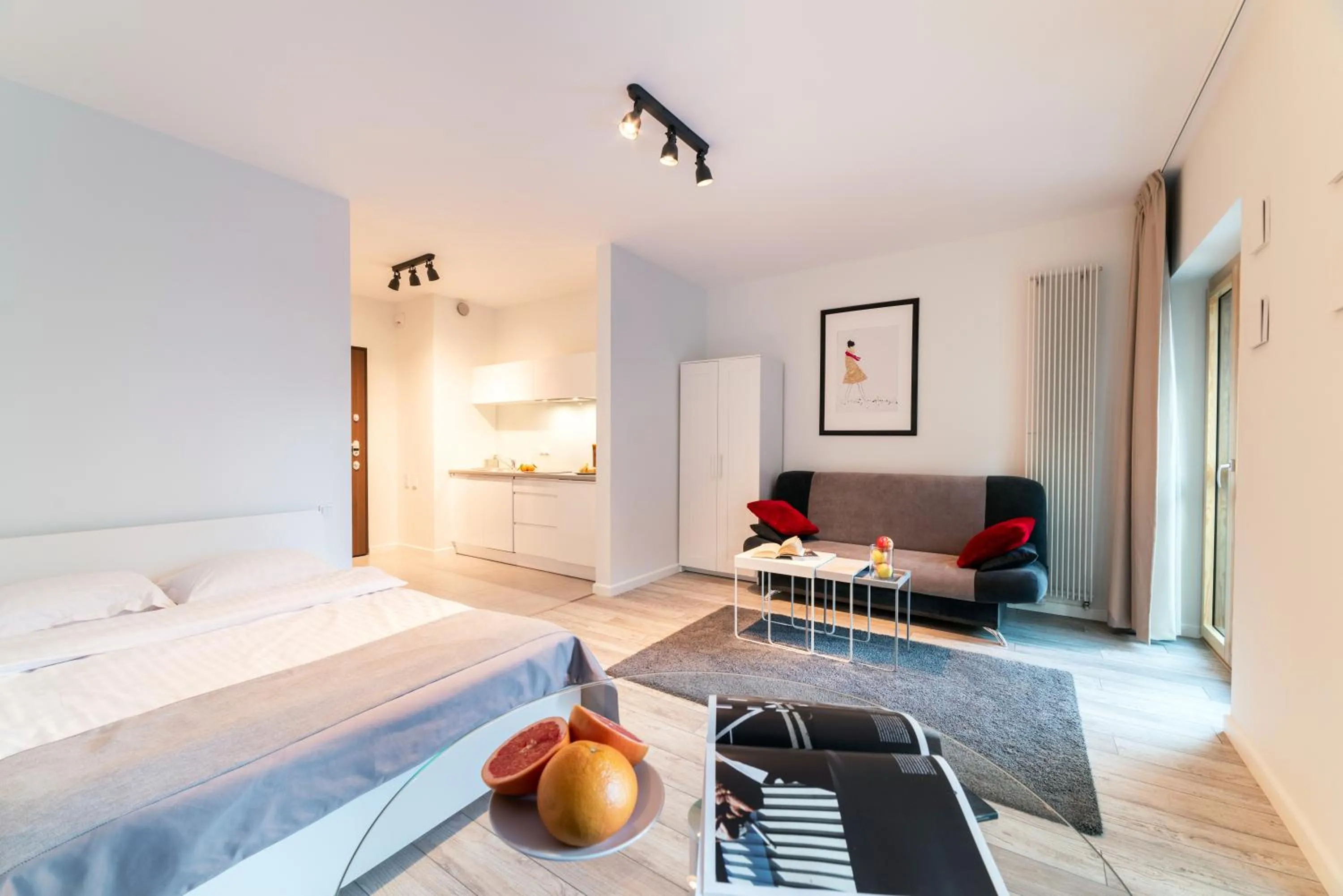 Seating area, Bed in Mennica Central Apartments