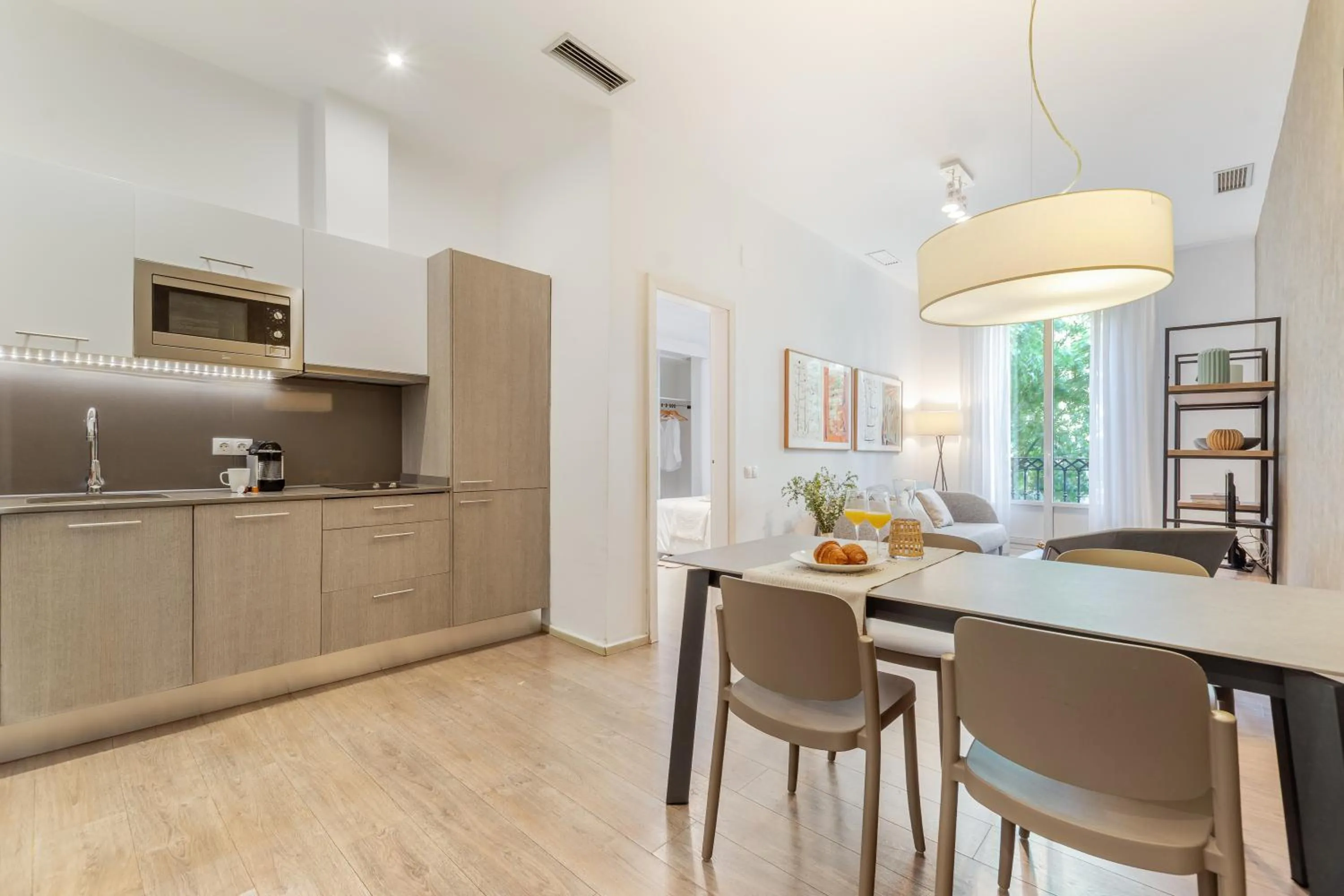 Kitchen or kitchenette in Aspasios Rambla Catalunya Apartments