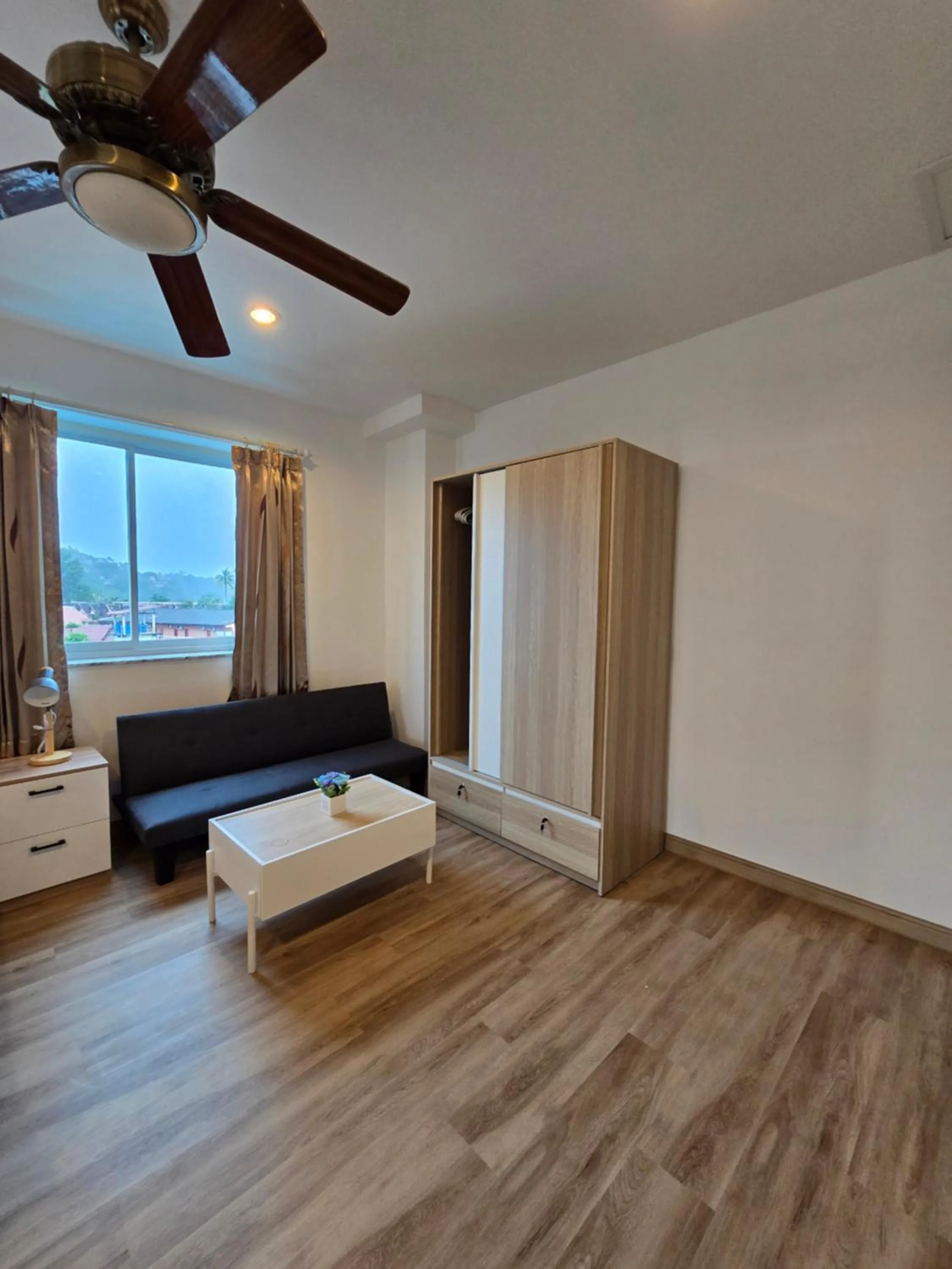 Seating area, Bed in Baan Rosa Bangtao Beach