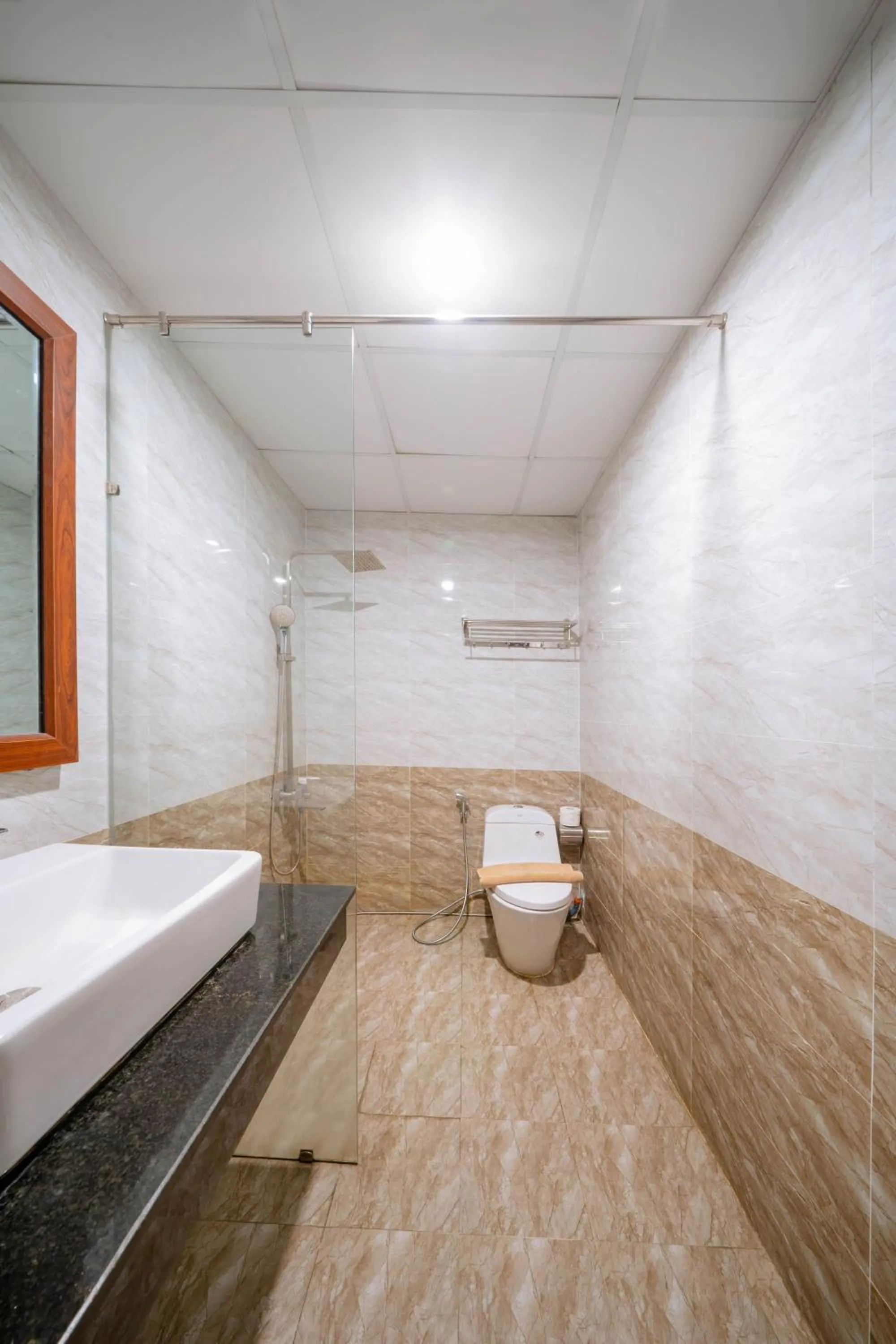 Shower in Quoc Cuong Center Da Nang Hotel by Haviland