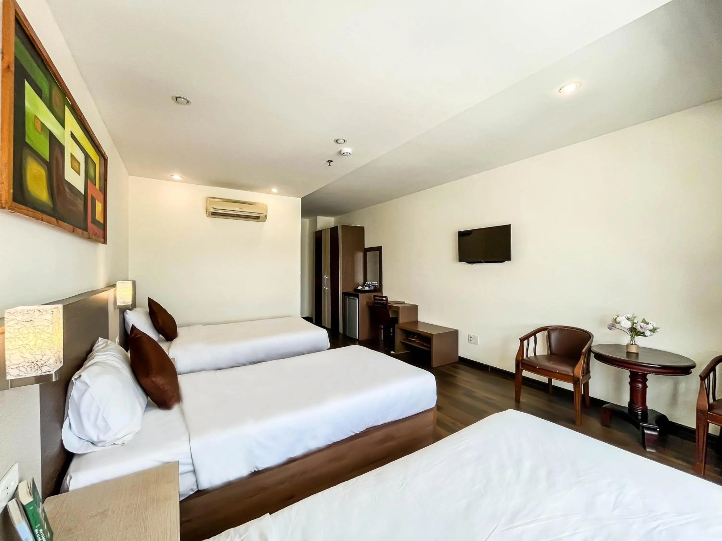 Bed in Quoc Cuong Center Da Nang Hotel by Haviland