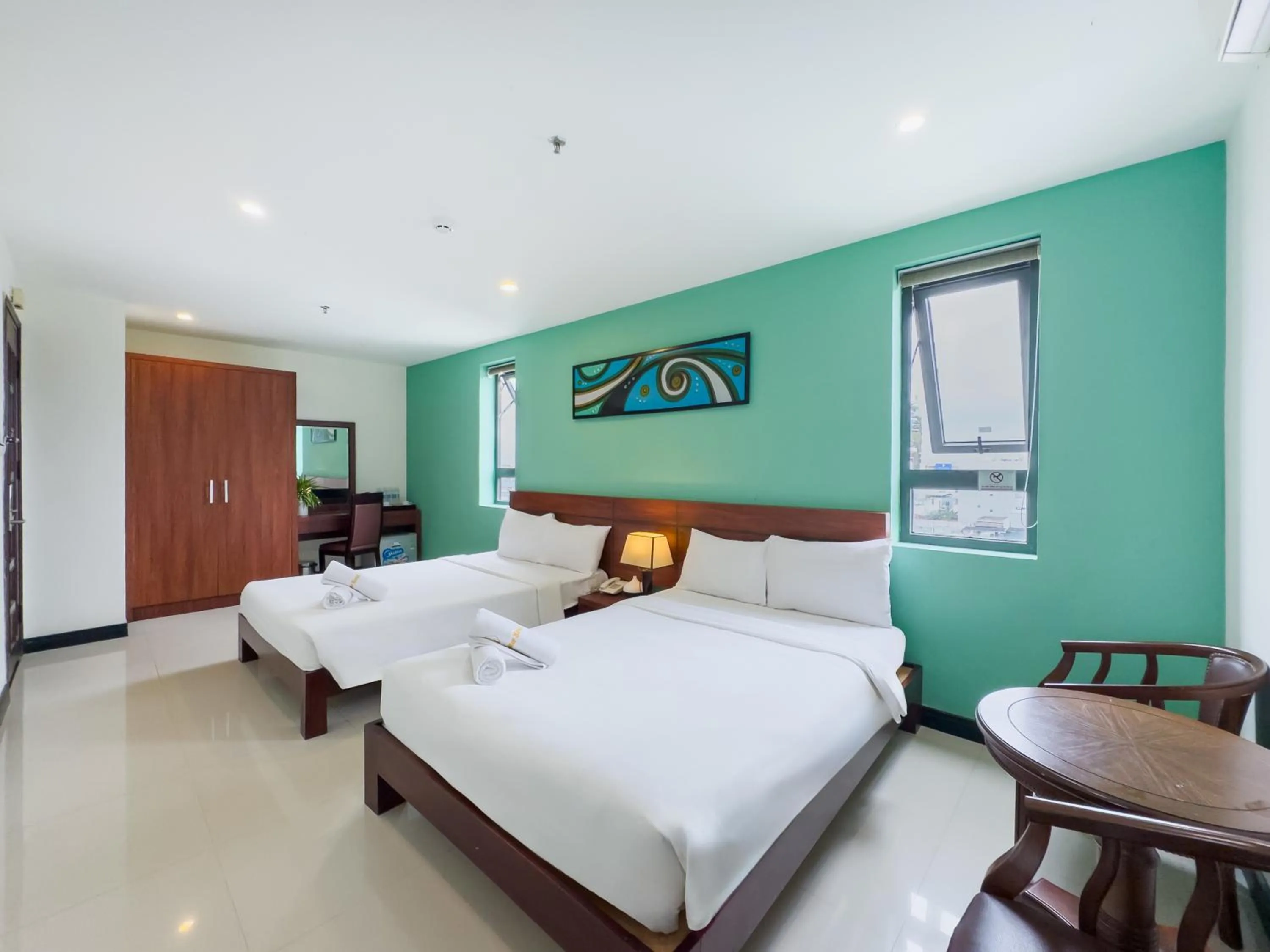 Photo of the whole room, Bed in Quoc Cuong Center Da Nang Hotel by Haviland