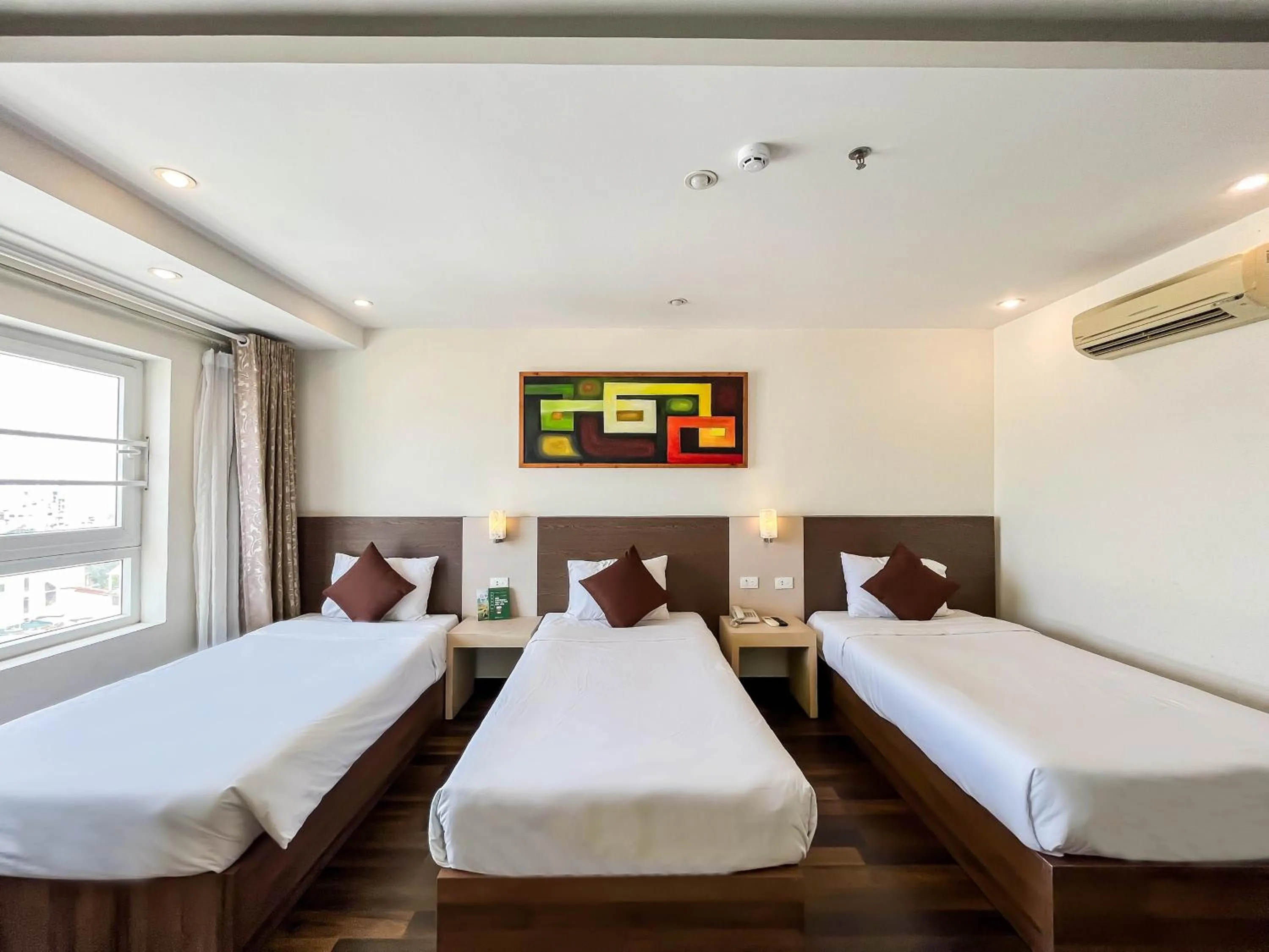 Bed in Quoc Cuong Center Da Nang Hotel by Haviland