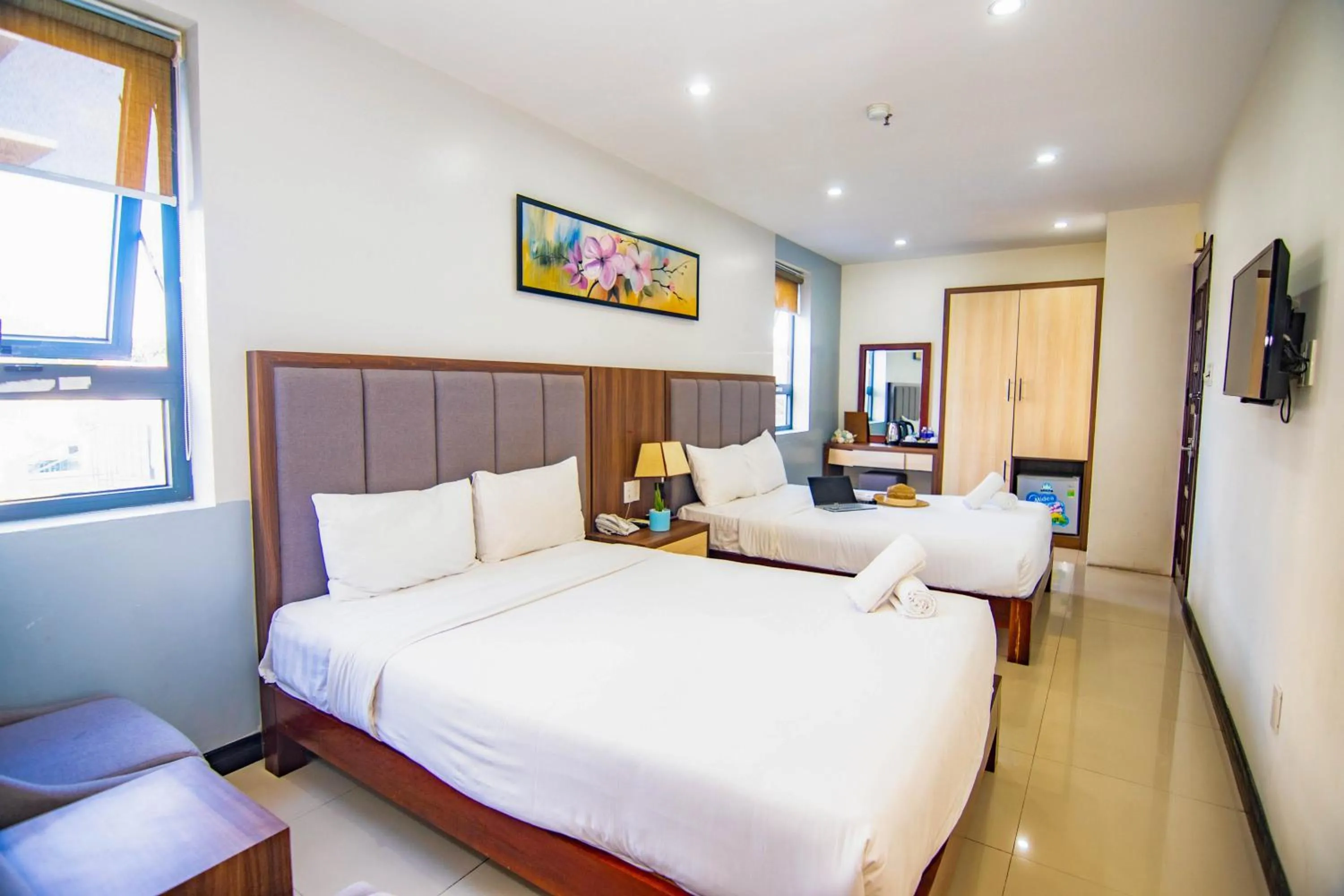 Bed in Quoc Cuong Center Da Nang Hotel by Haviland