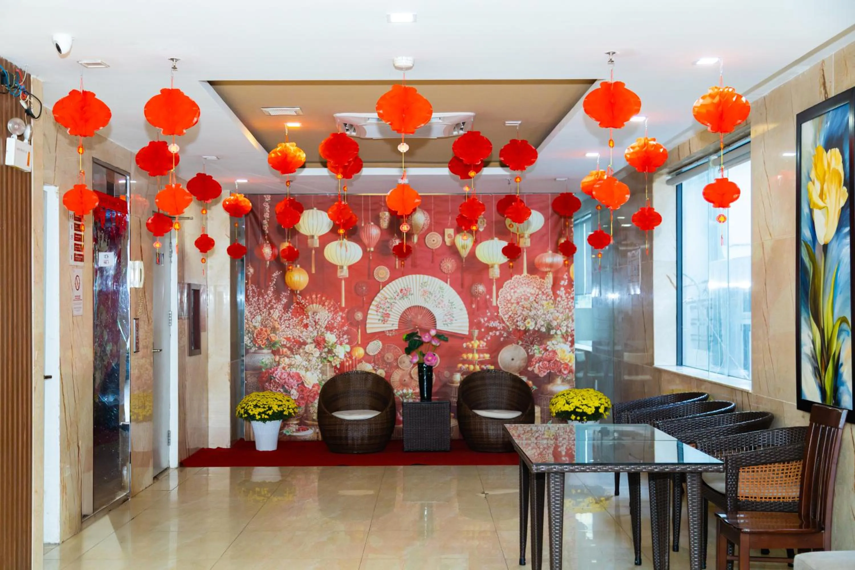 Communal lounge/ TV room in Quoc Cuong Center Da Nang Hotel by Haviland