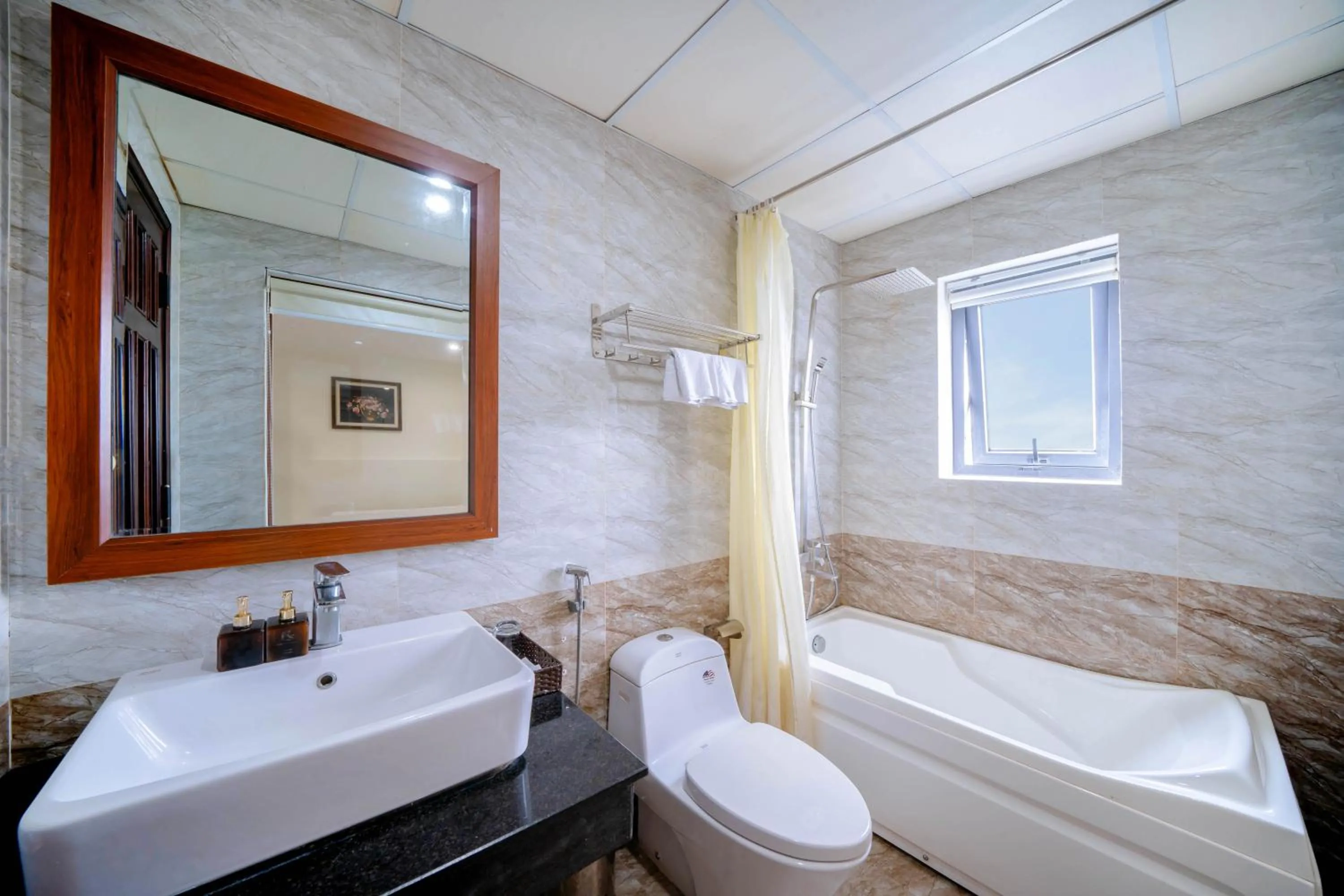 Shower in Quoc Cuong Center Da Nang Hotel by Haviland