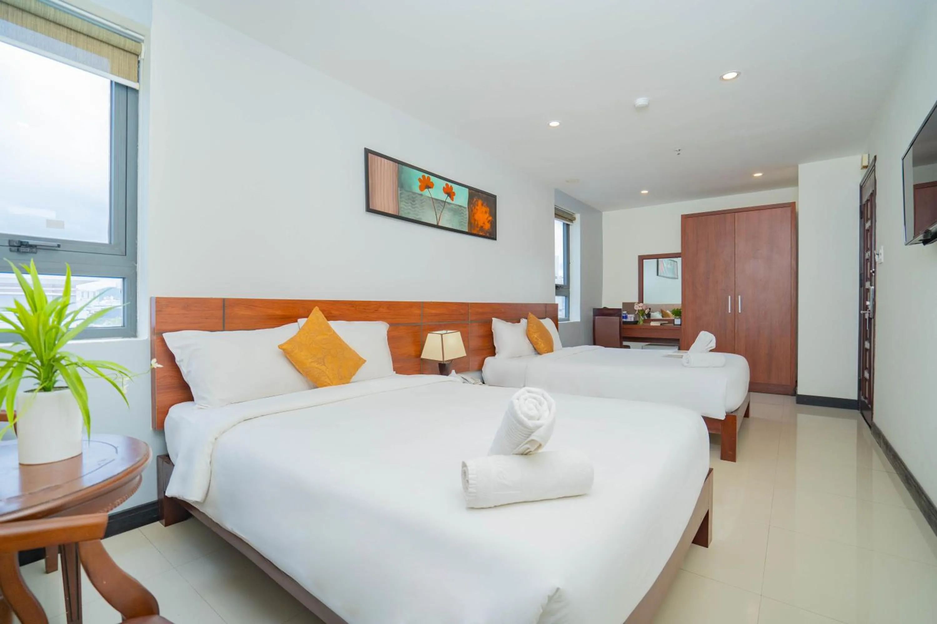 Photo of the whole room, Bed in Quoc Cuong Center Da Nang Hotel by Haviland