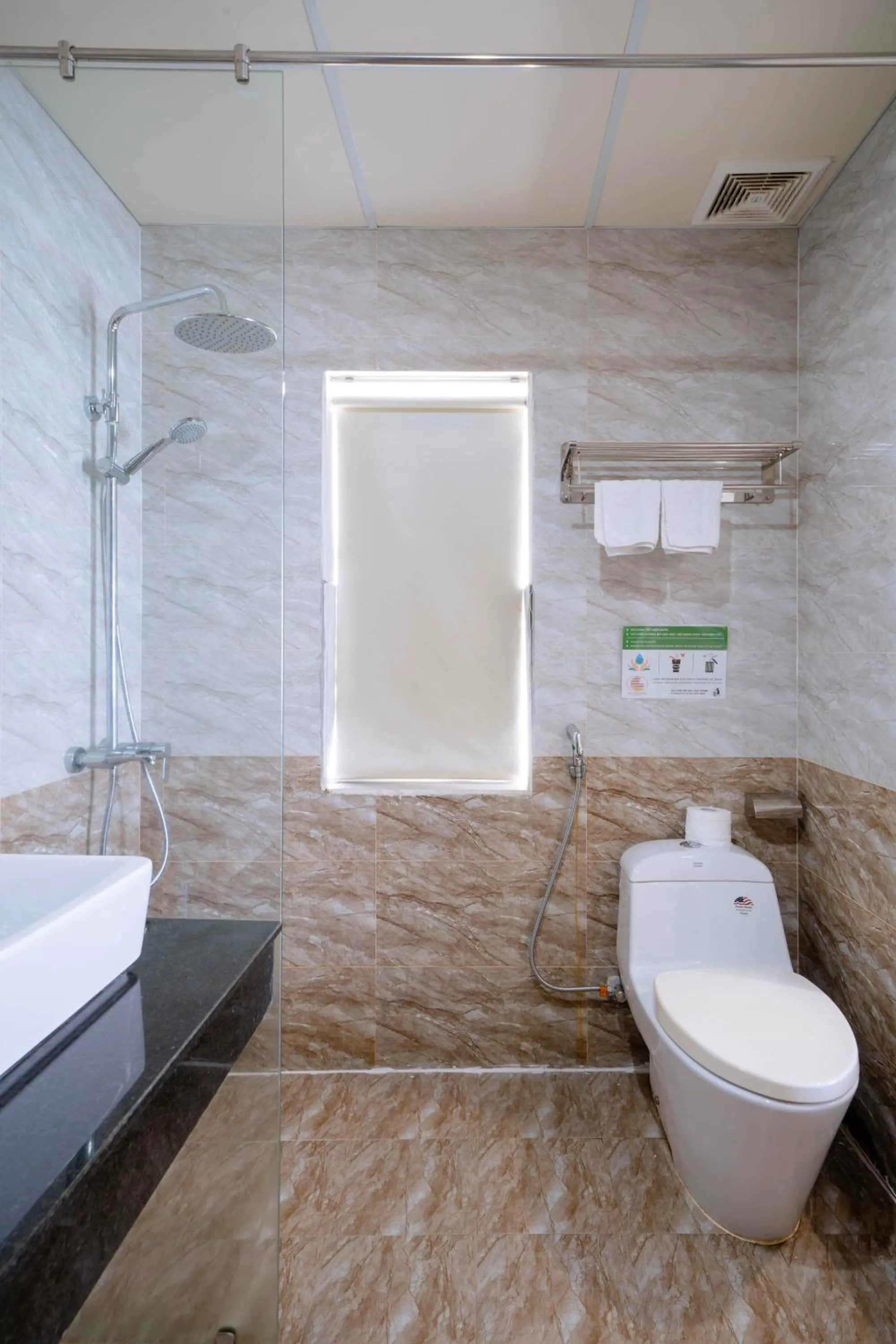 Shower in Quoc Cuong Center Da Nang Hotel by Haviland