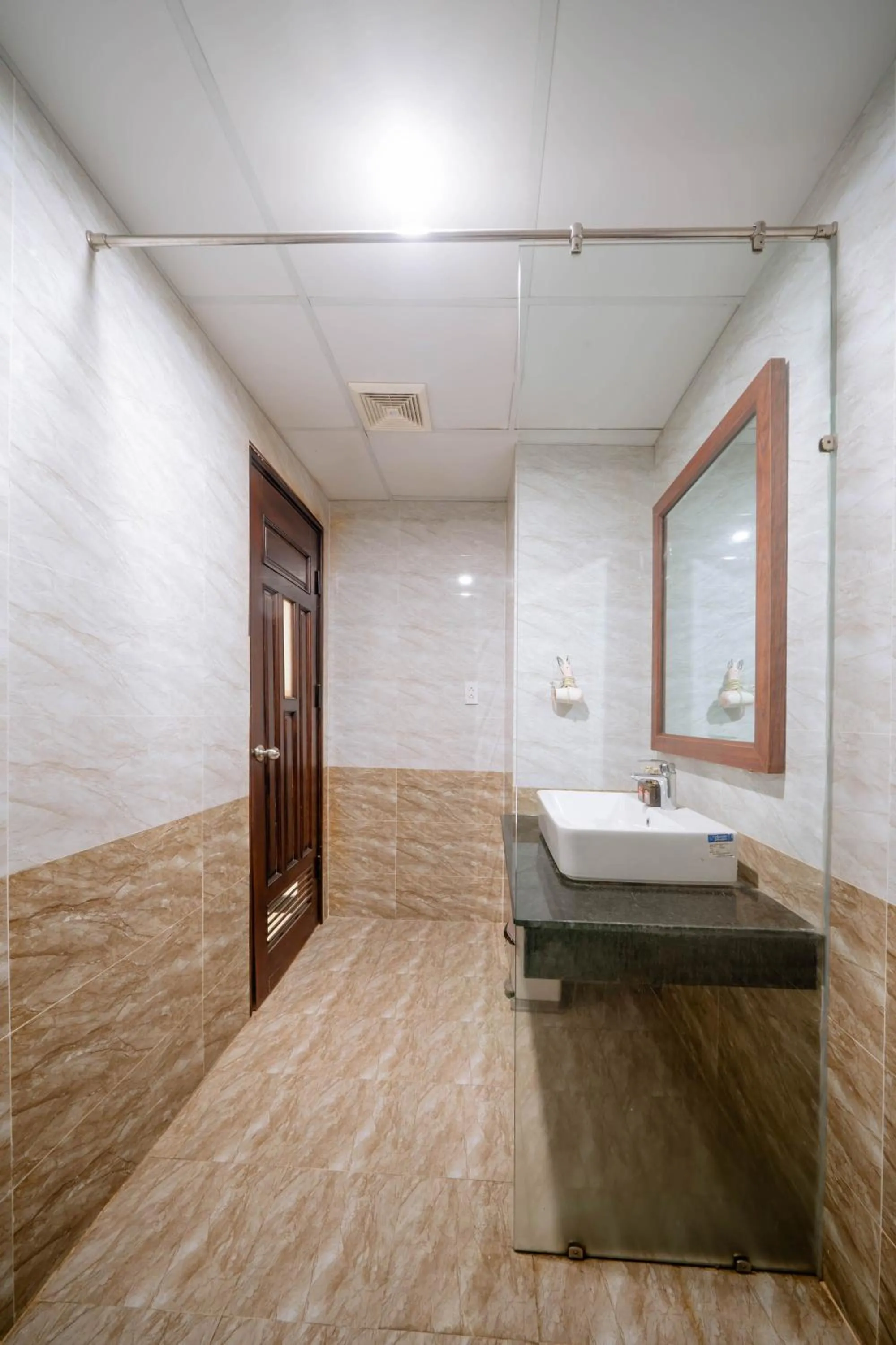 Shower in Quoc Cuong Center Da Nang Hotel by Haviland