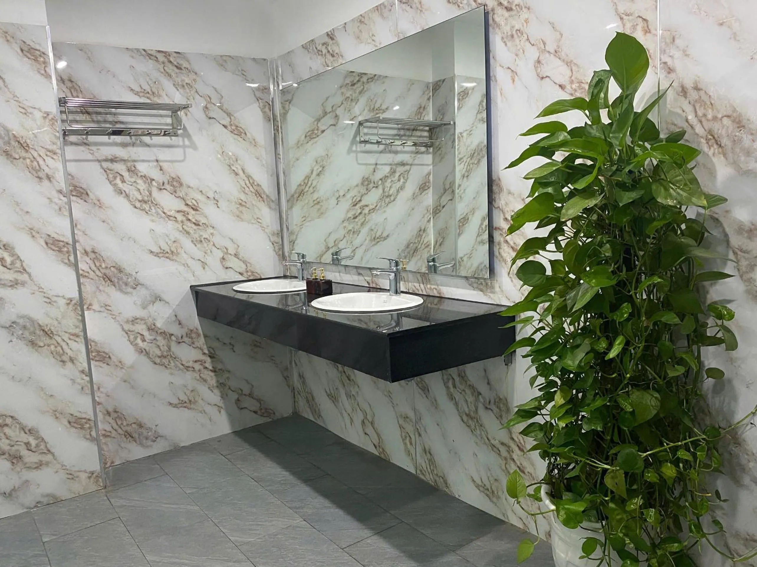 Toilet in Quoc Cuong Center Da Nang Hotel by Haviland