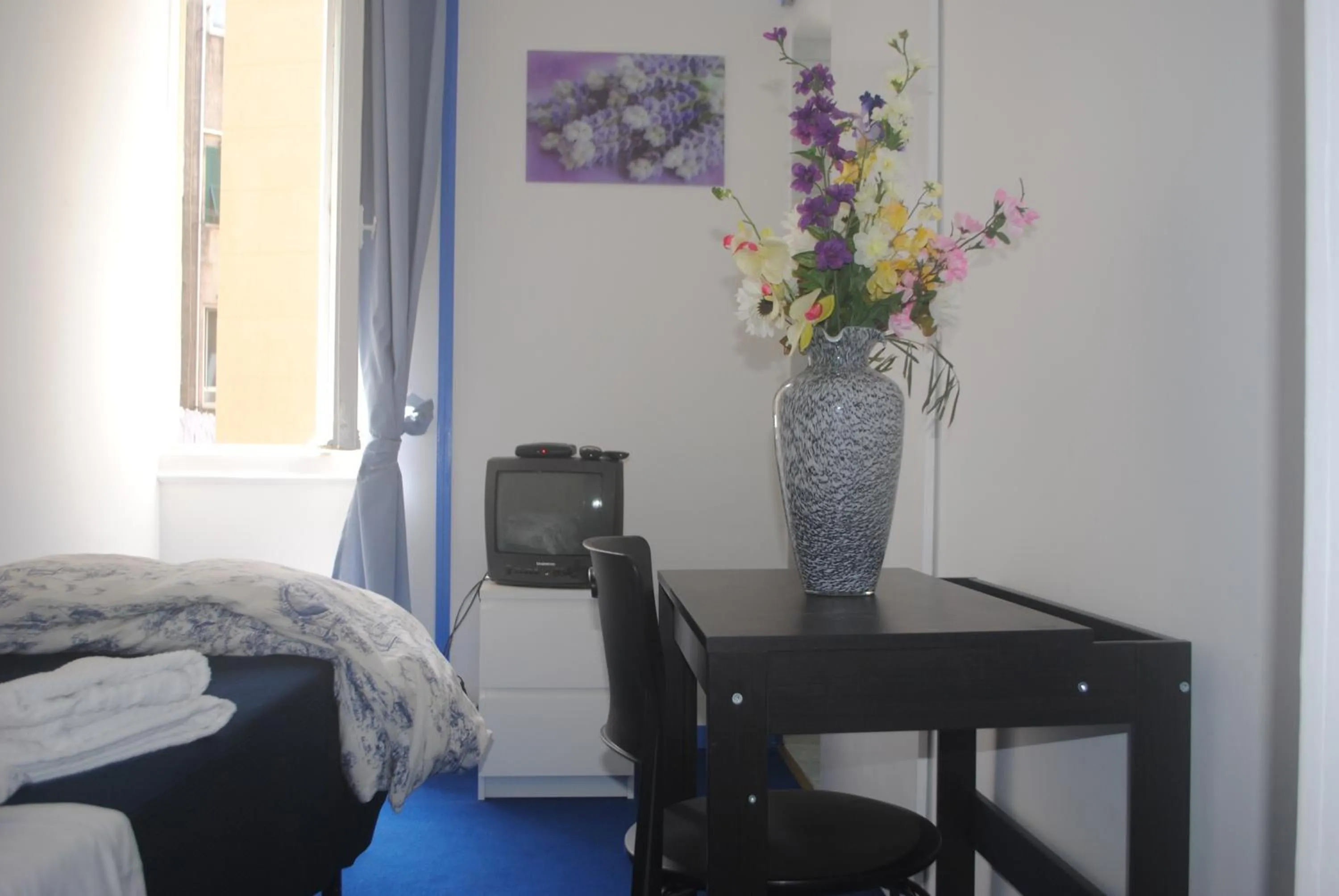 Decorative detail, Bed in Olympia Hotel