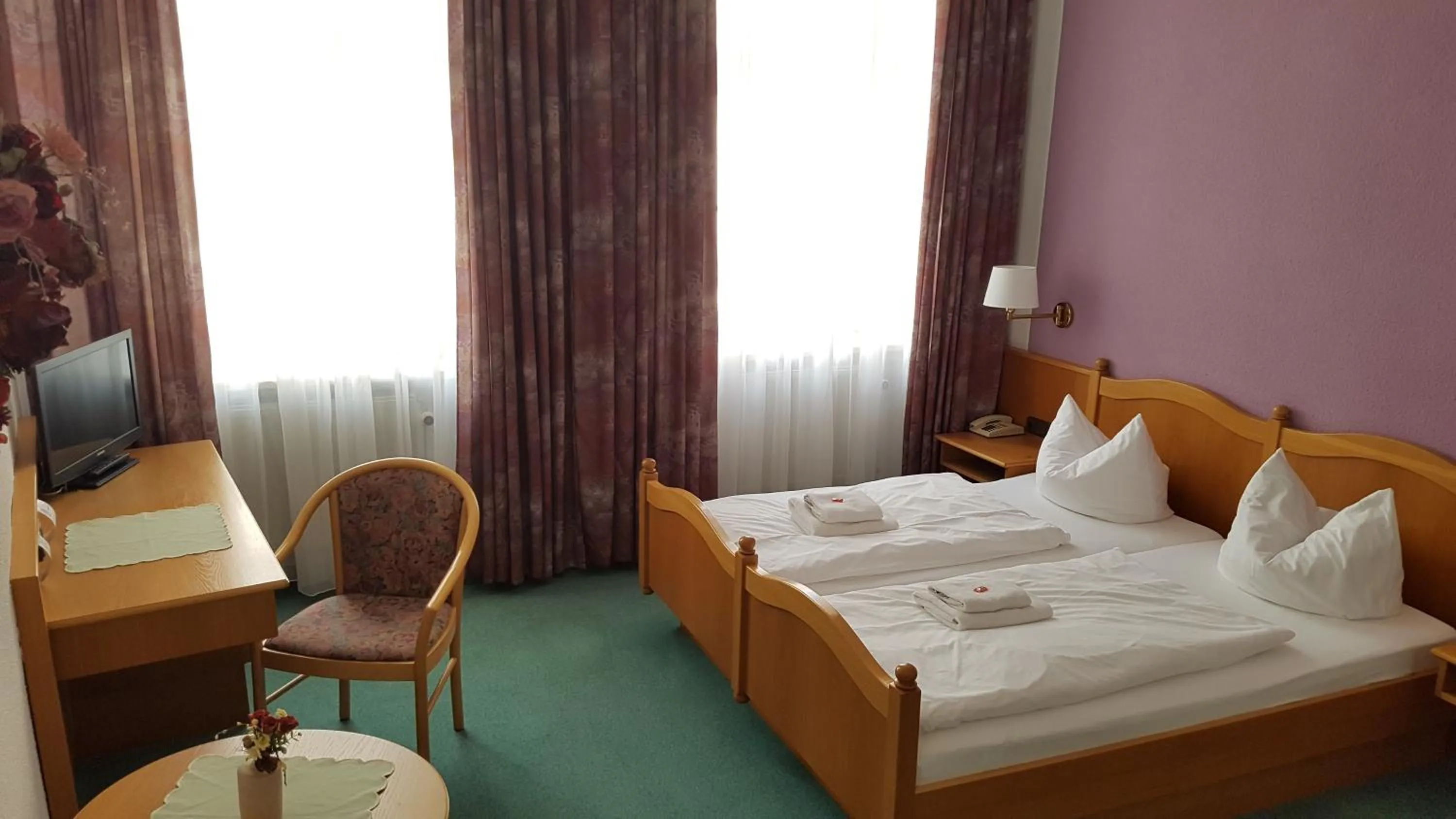 Bed in Hotel Sachsenhof