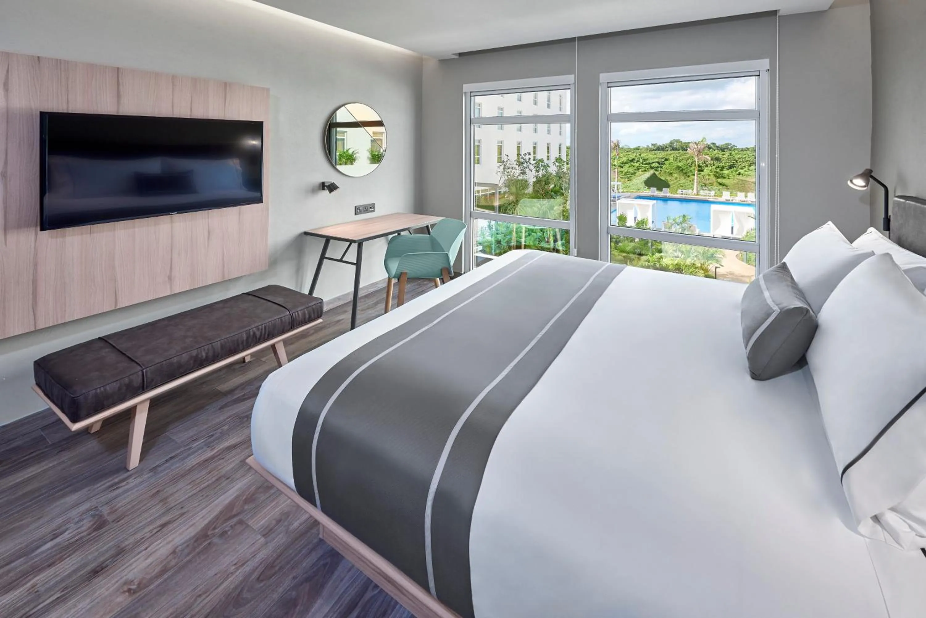 Bedroom, Bed in City Express Plus by Marriott Cancun Aeropuerto Riviera