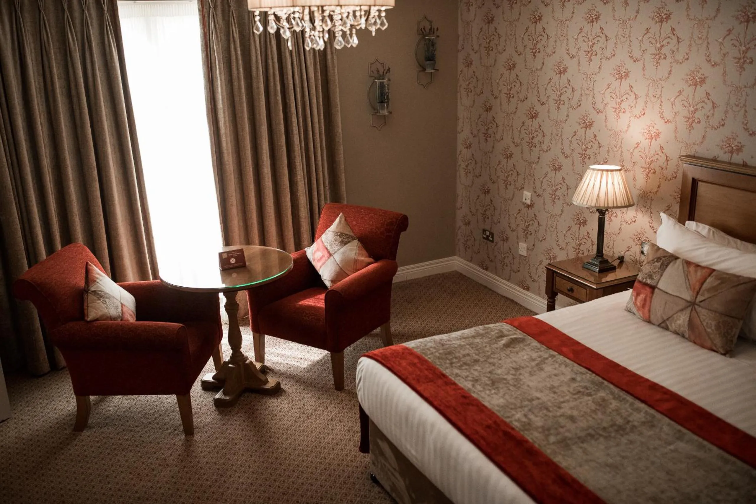 Seating area, Bed in Clanard Court Hotel