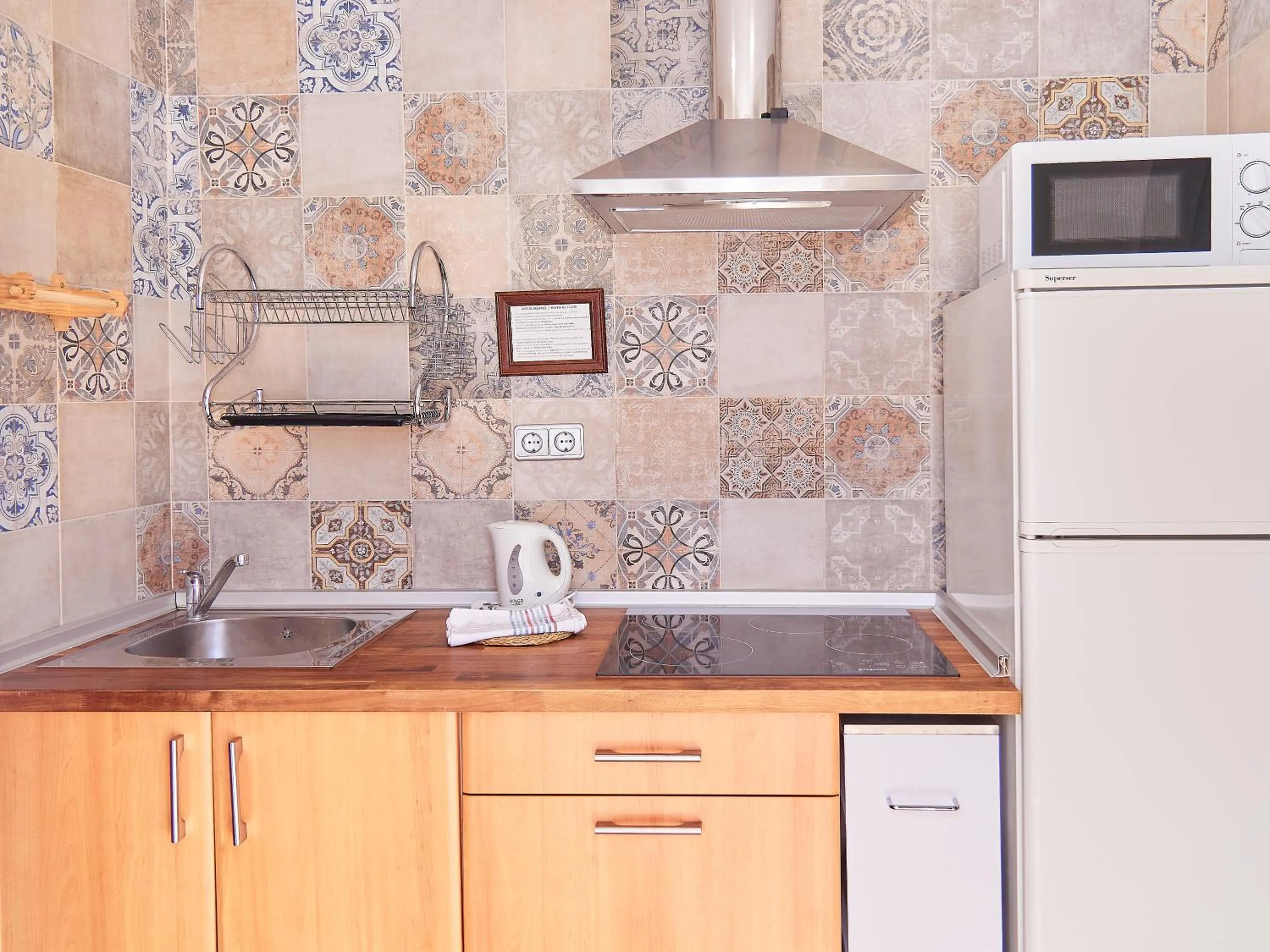 Kitchen or kitchenette in Apartamentos Jerez