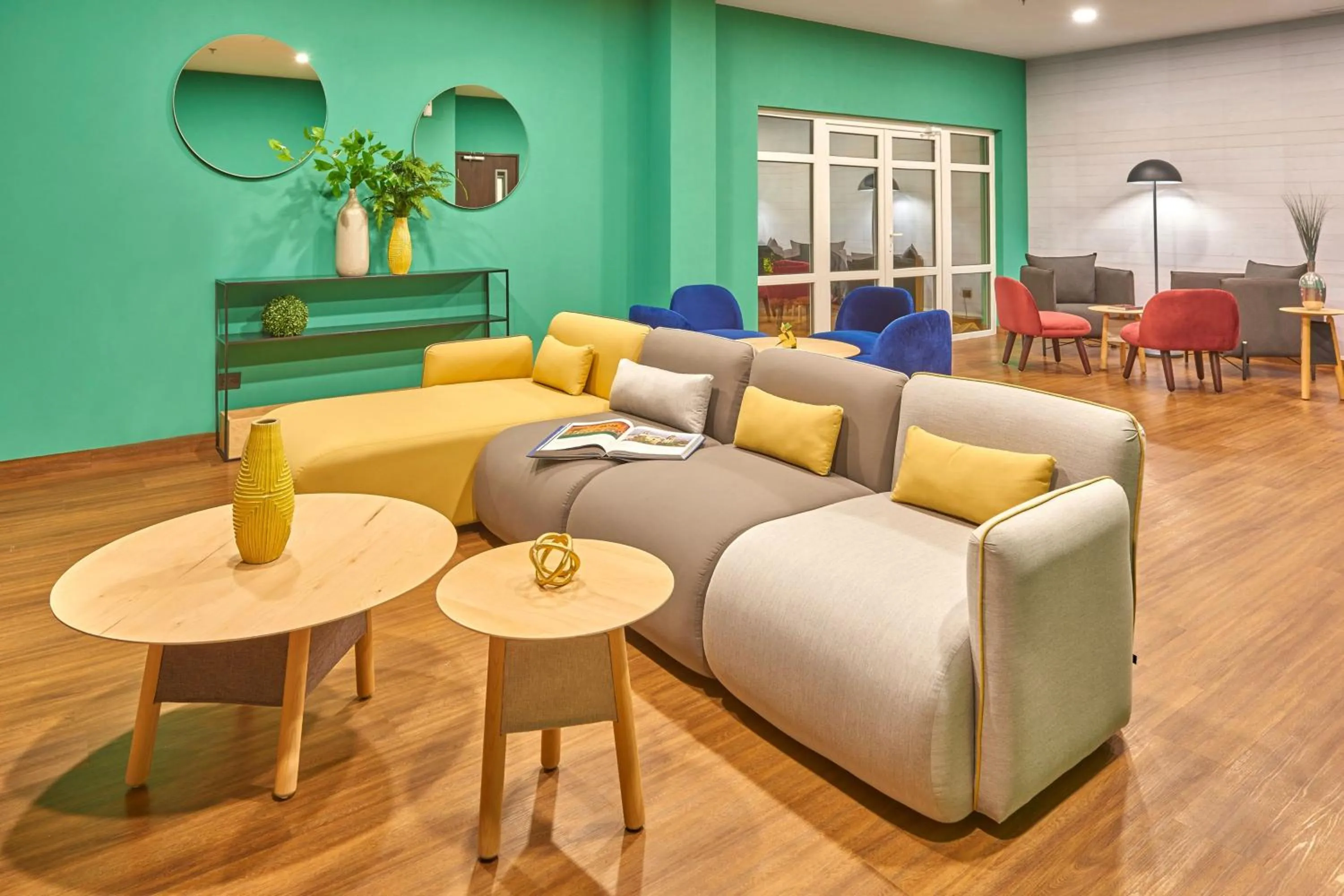 Living room in City Express Suites by Marriott Cancún Aeropuerto