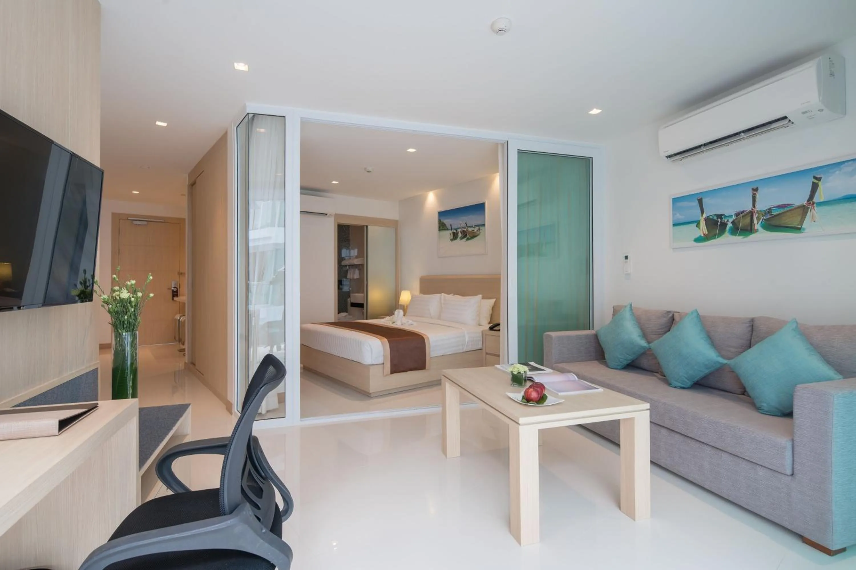 Bed in The Beachfront Hotel Phuket