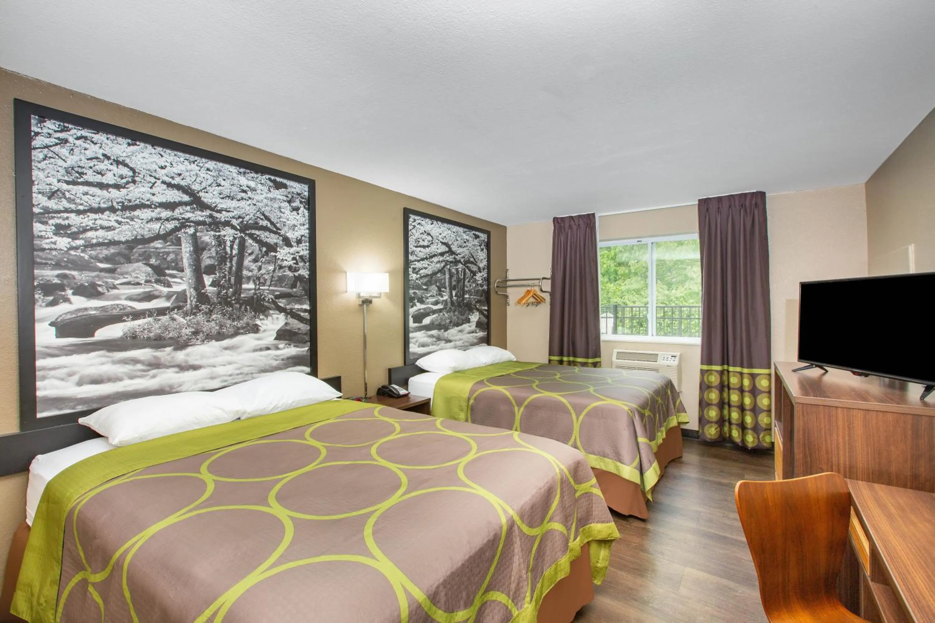 Bed in Super 8 by Wyndham Chattanooga Lookout Mountain TN