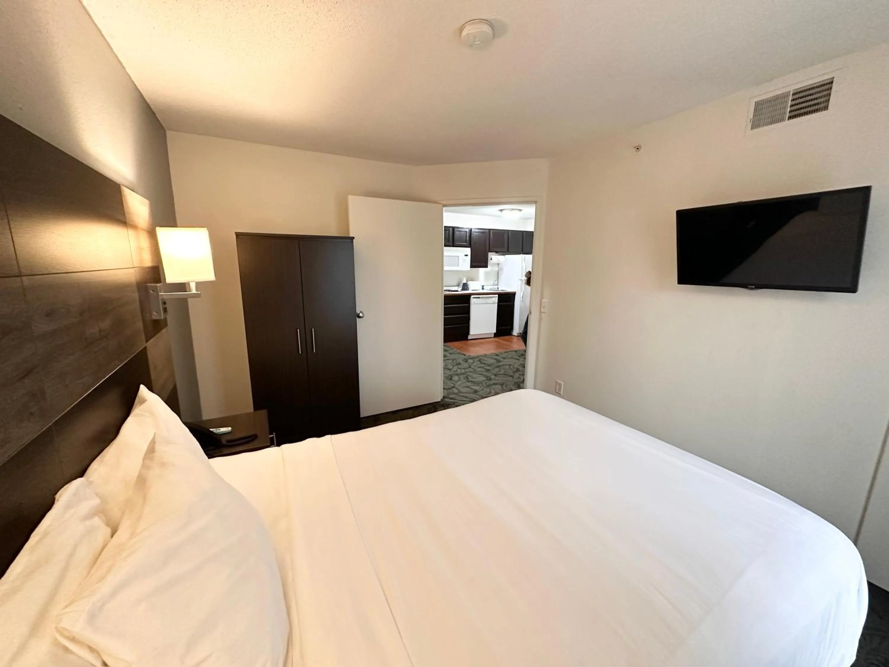 Bed in MainStay Suites Madison Airport