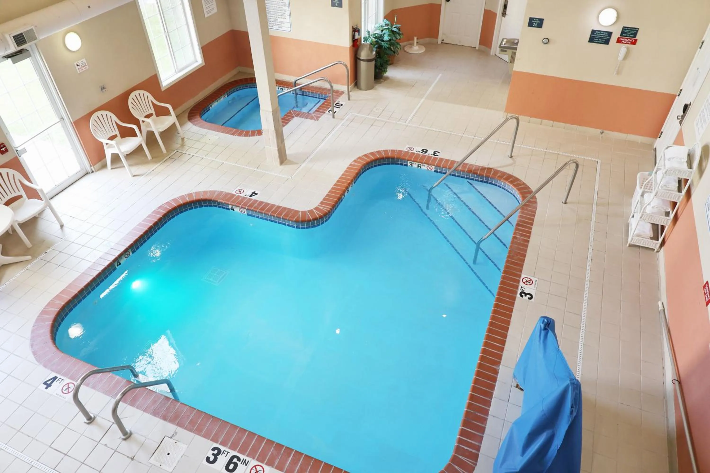 Swimming pool in MainStay Suites Madison Airport