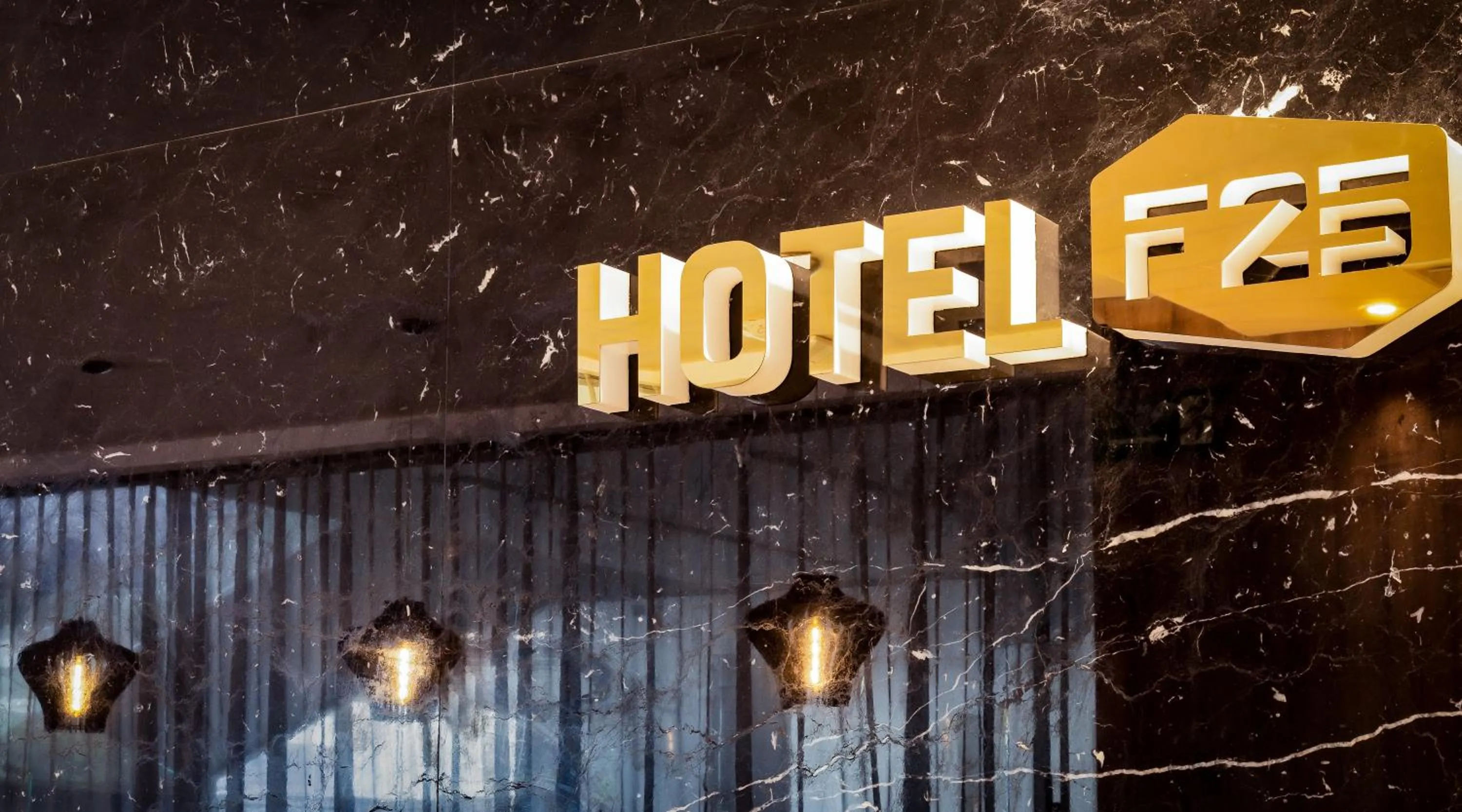 Property logo or sign in Hotel F25