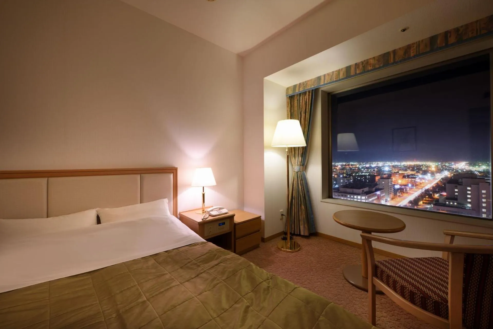 Bedroom in Grand Hotel New Oji