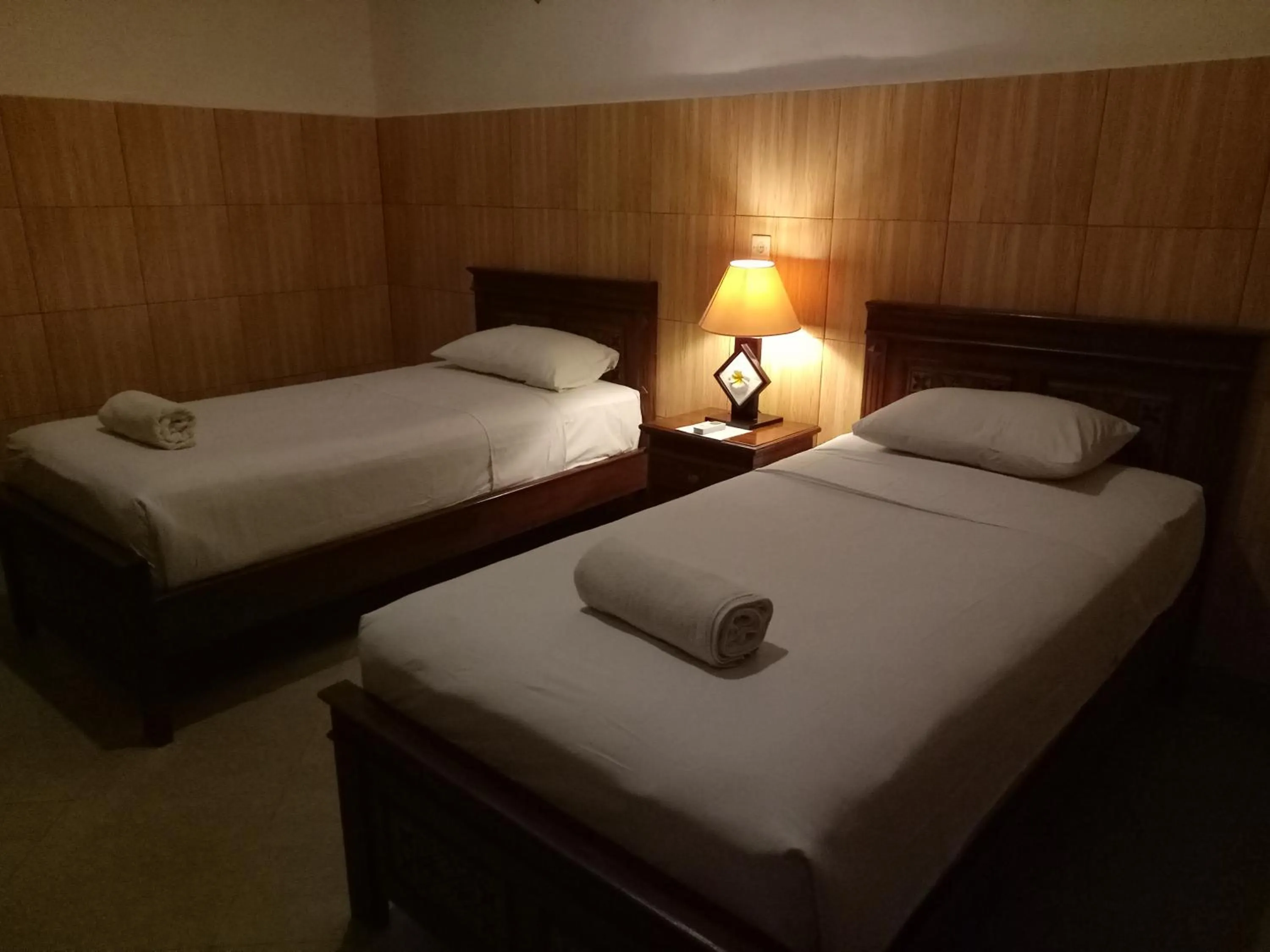 Bed in Nitya Home Stay Lembongan