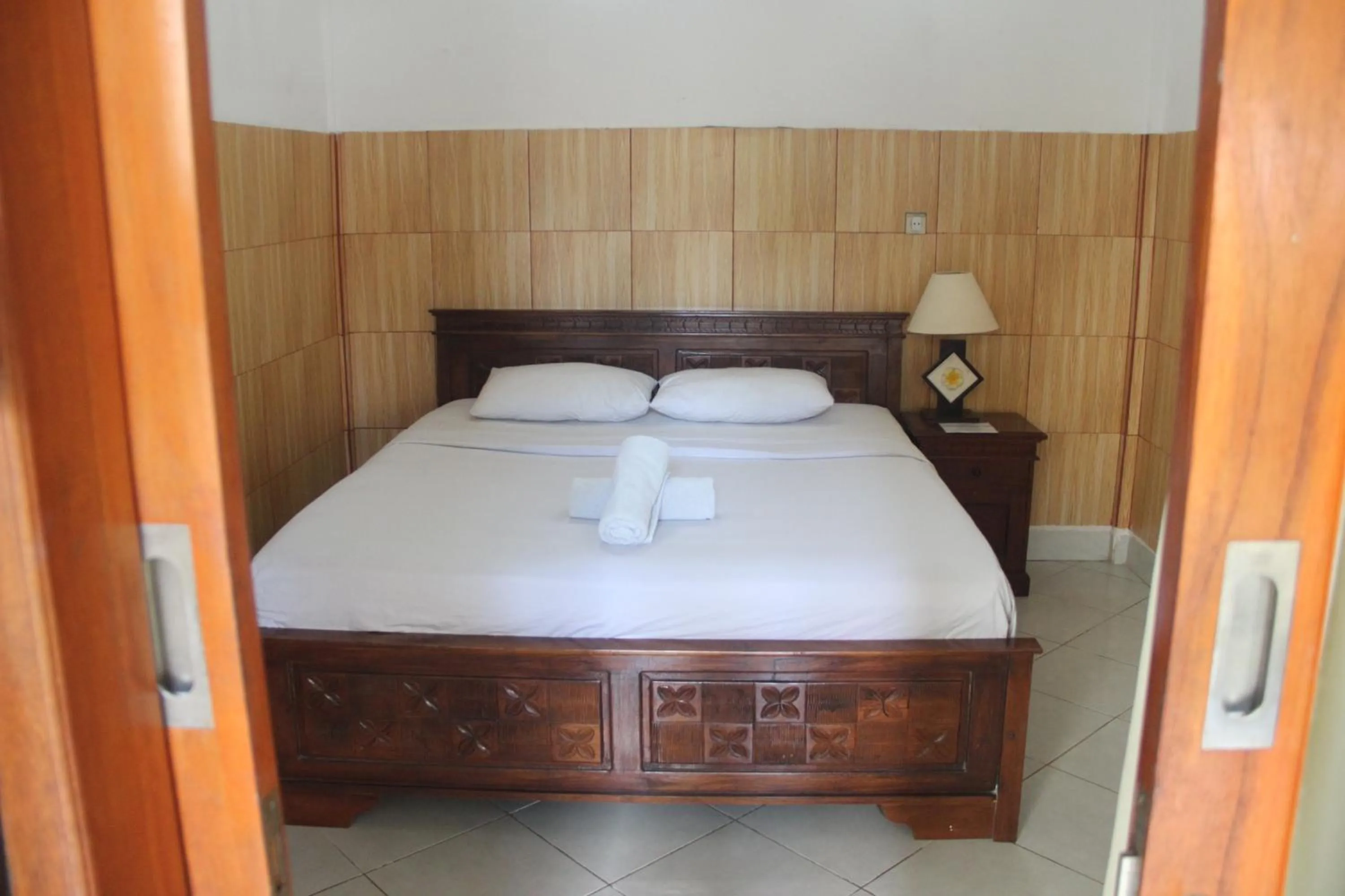 Bed in Nitya Home Stay Lembongan