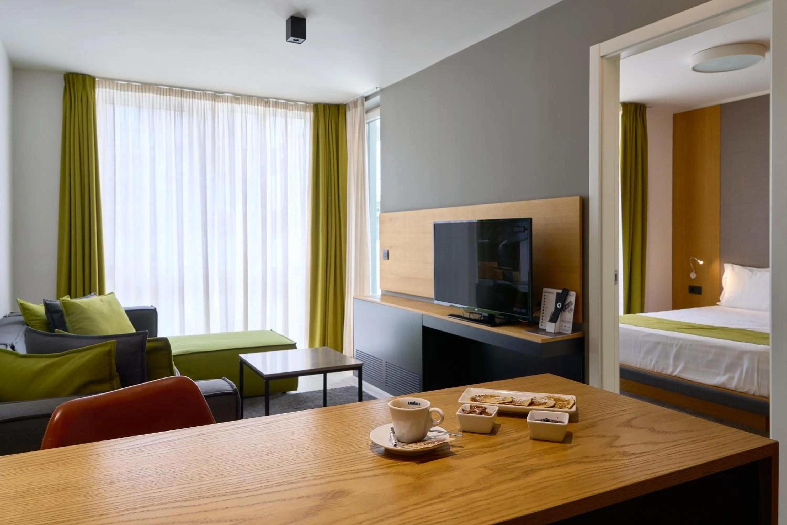 TV and multimedia in Adella Boutique Hotel - Free Secured Parking