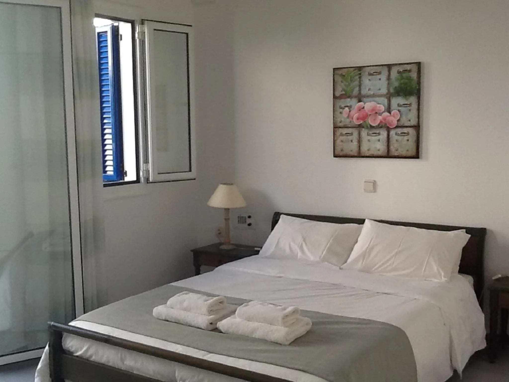 Bed in Astra Hotel Apartments