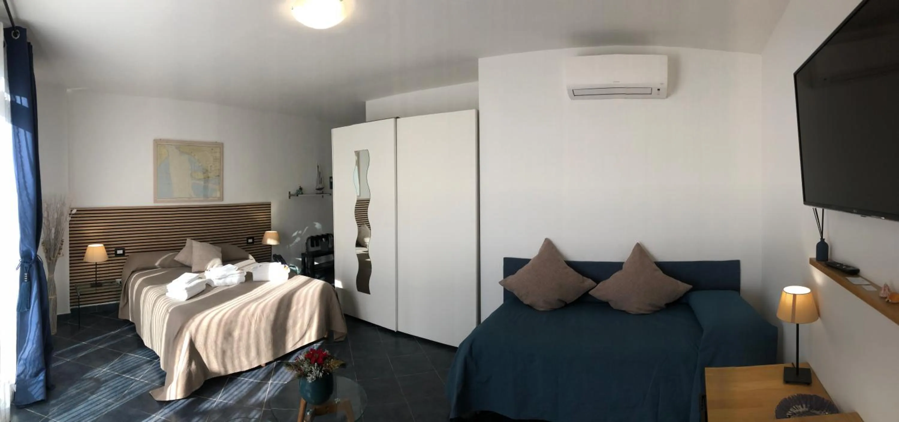 Photo of the whole room, Bed in Baia Blu RTA Residence