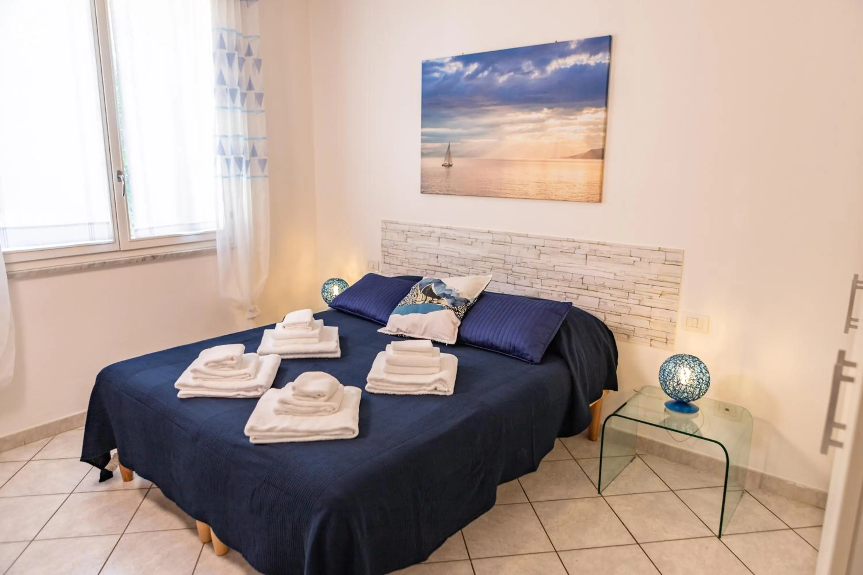 Photo of the whole room, Bed in Baia Blu RTA Residence
