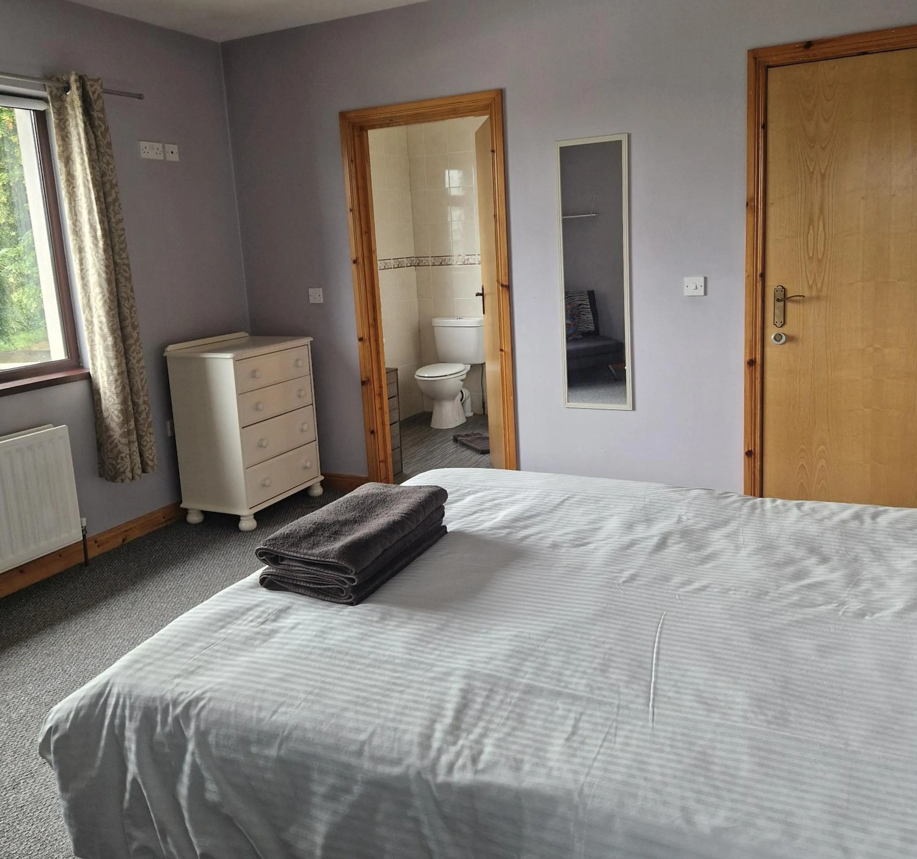 Bed in The Tree-house B&B