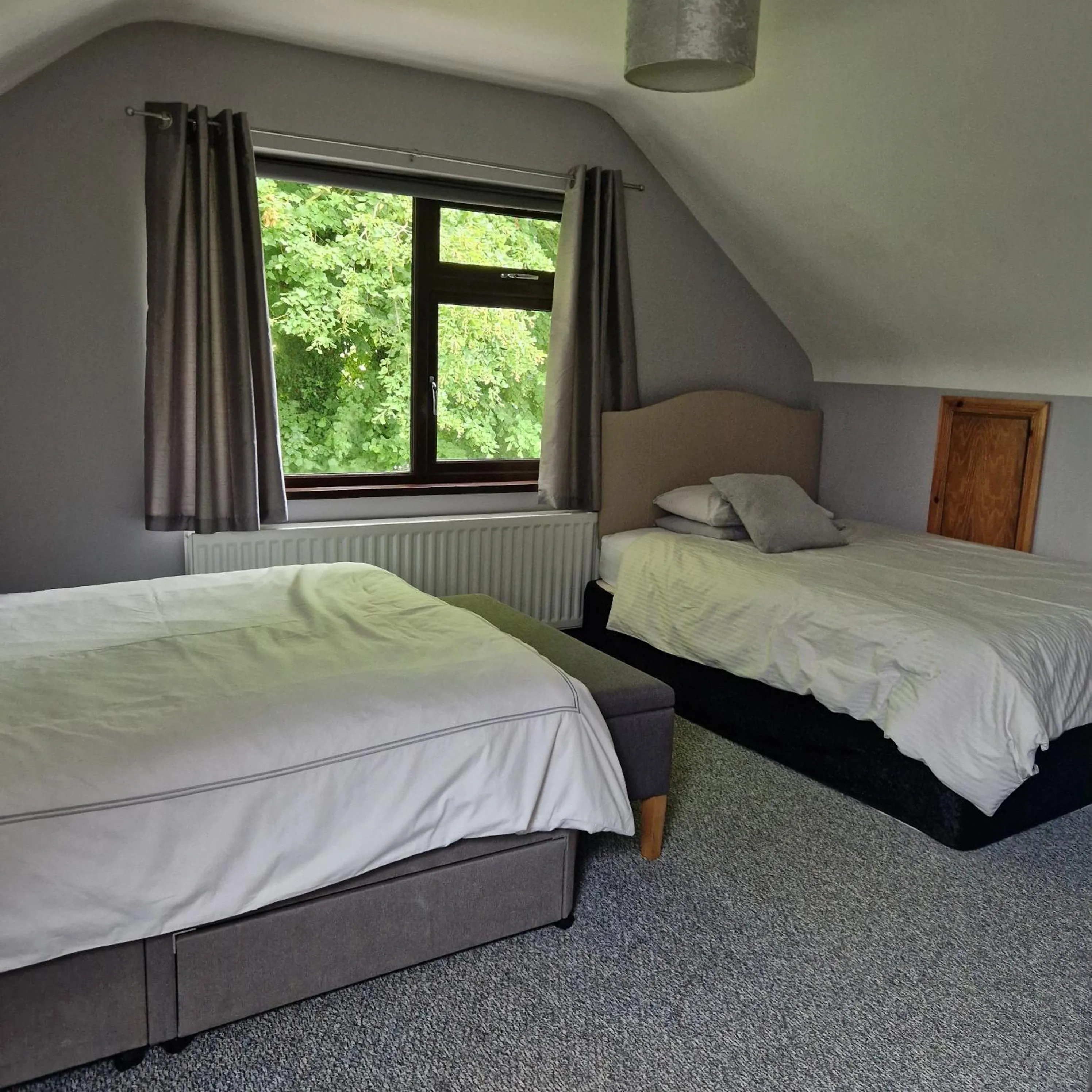 Bed in The Tree-house B&B