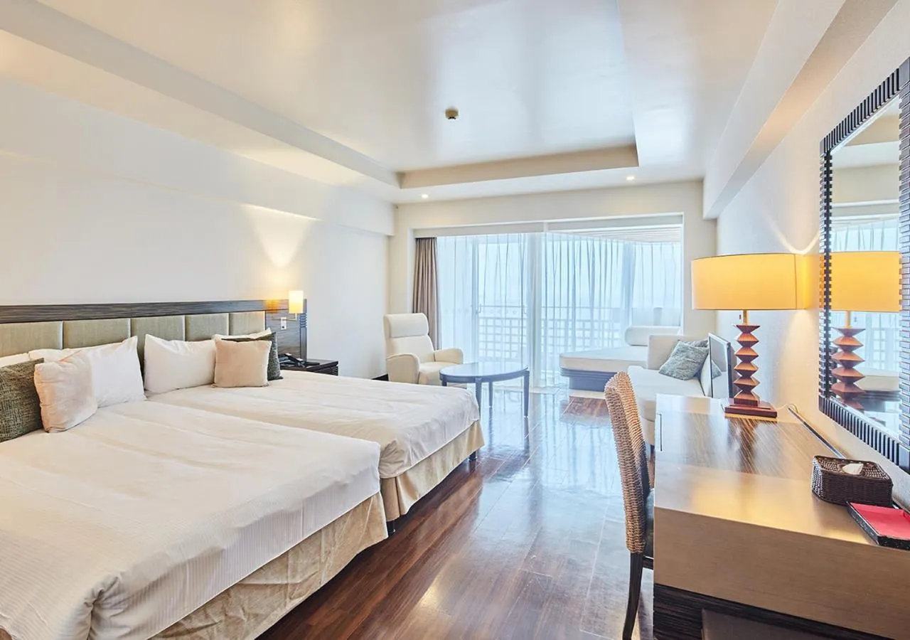 Photo of the whole room, Bed in Hotel Mahaina Wellness Resorts Okinawa