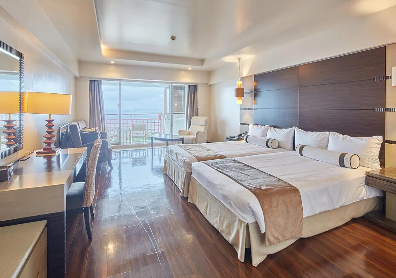 Photo of the whole room, Bed in Hotel Mahaina Wellness Resorts Okinawa