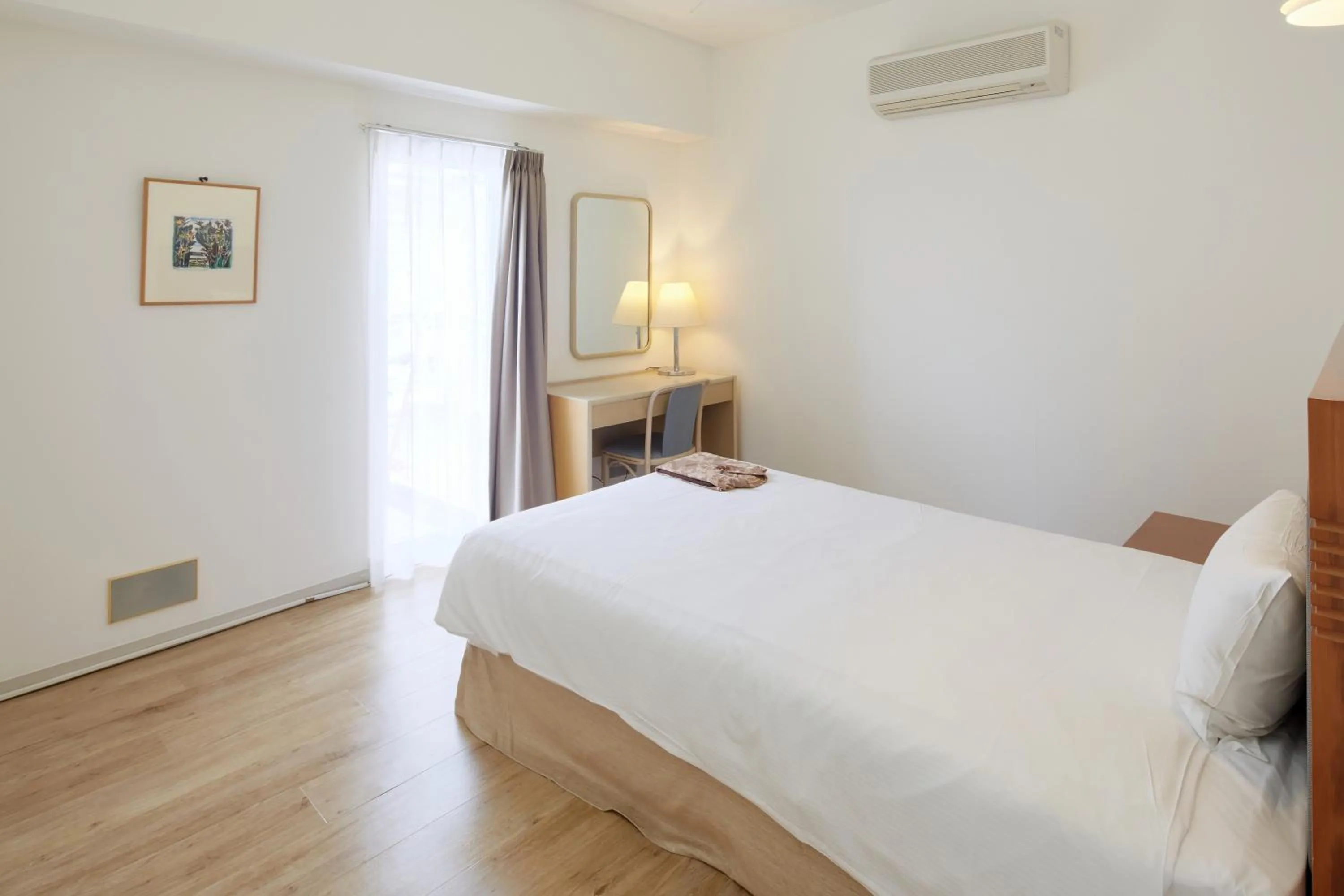 Bedroom, Bed in Hotel Mahaina Wellness Resorts Okinawa