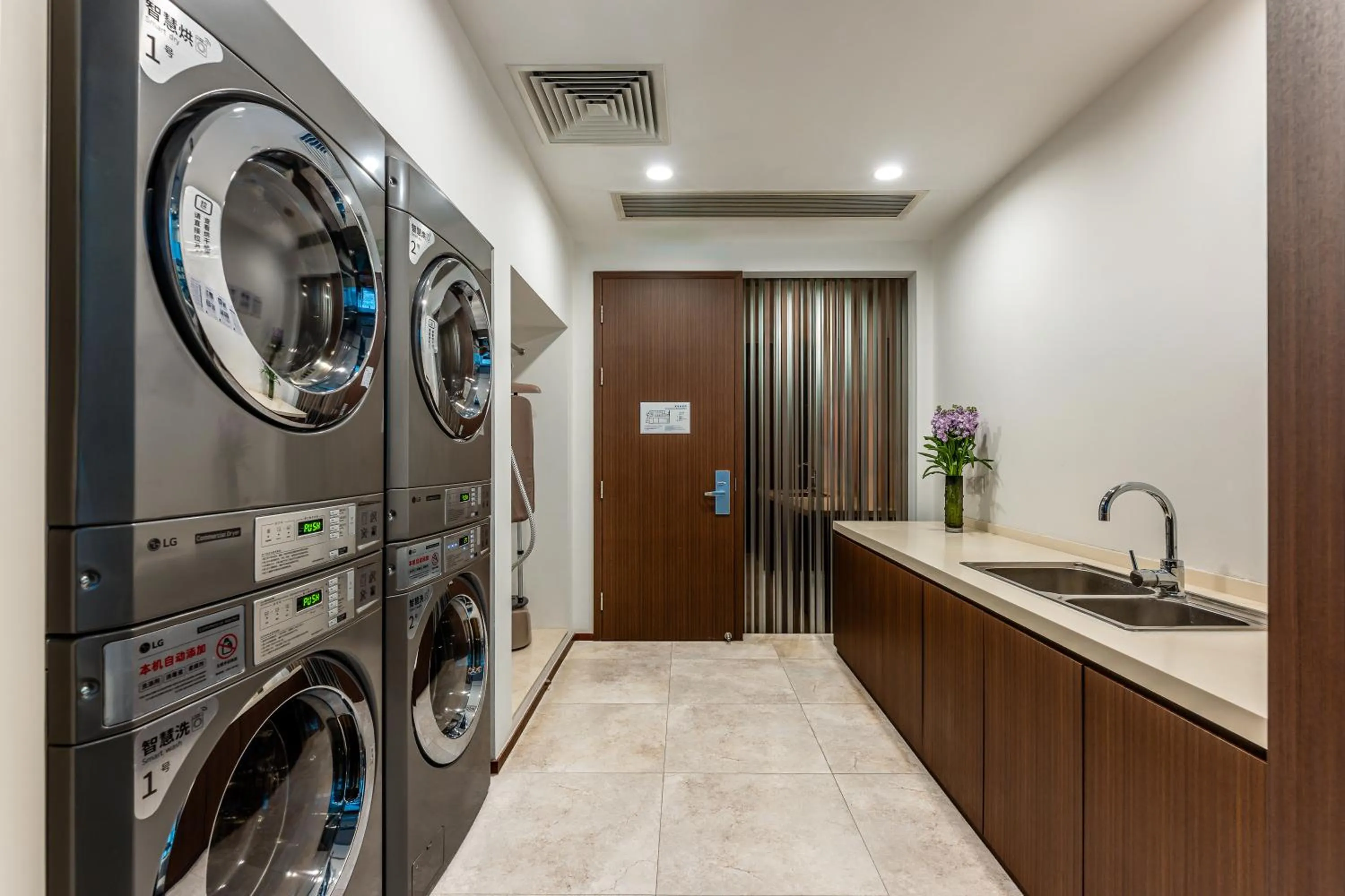 washing machine in Holiday Inn Express Shanghai Jinsha by IHG